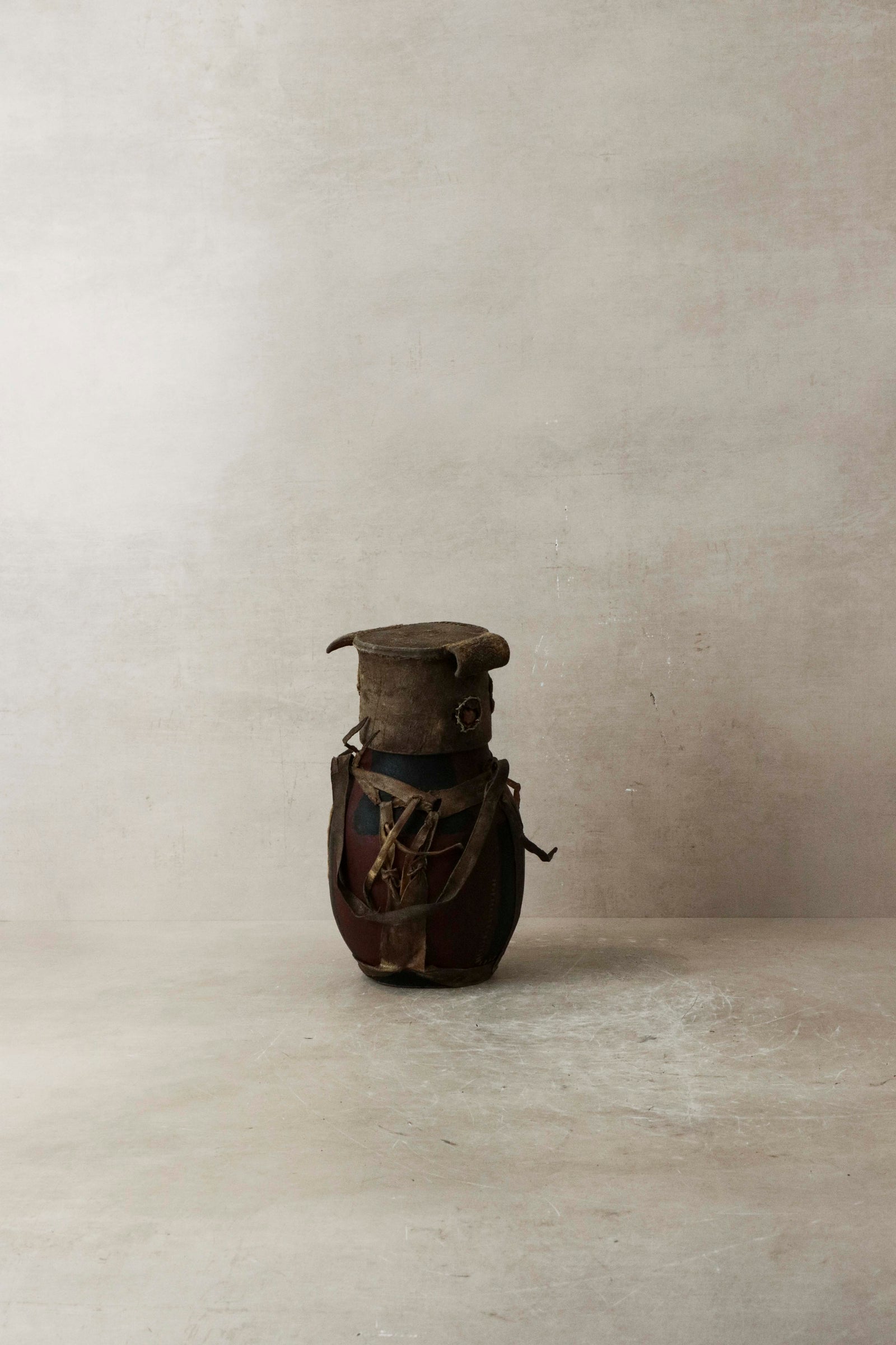 Vintage Turkana milk container hand-carved in Kenya with goat-leather detail