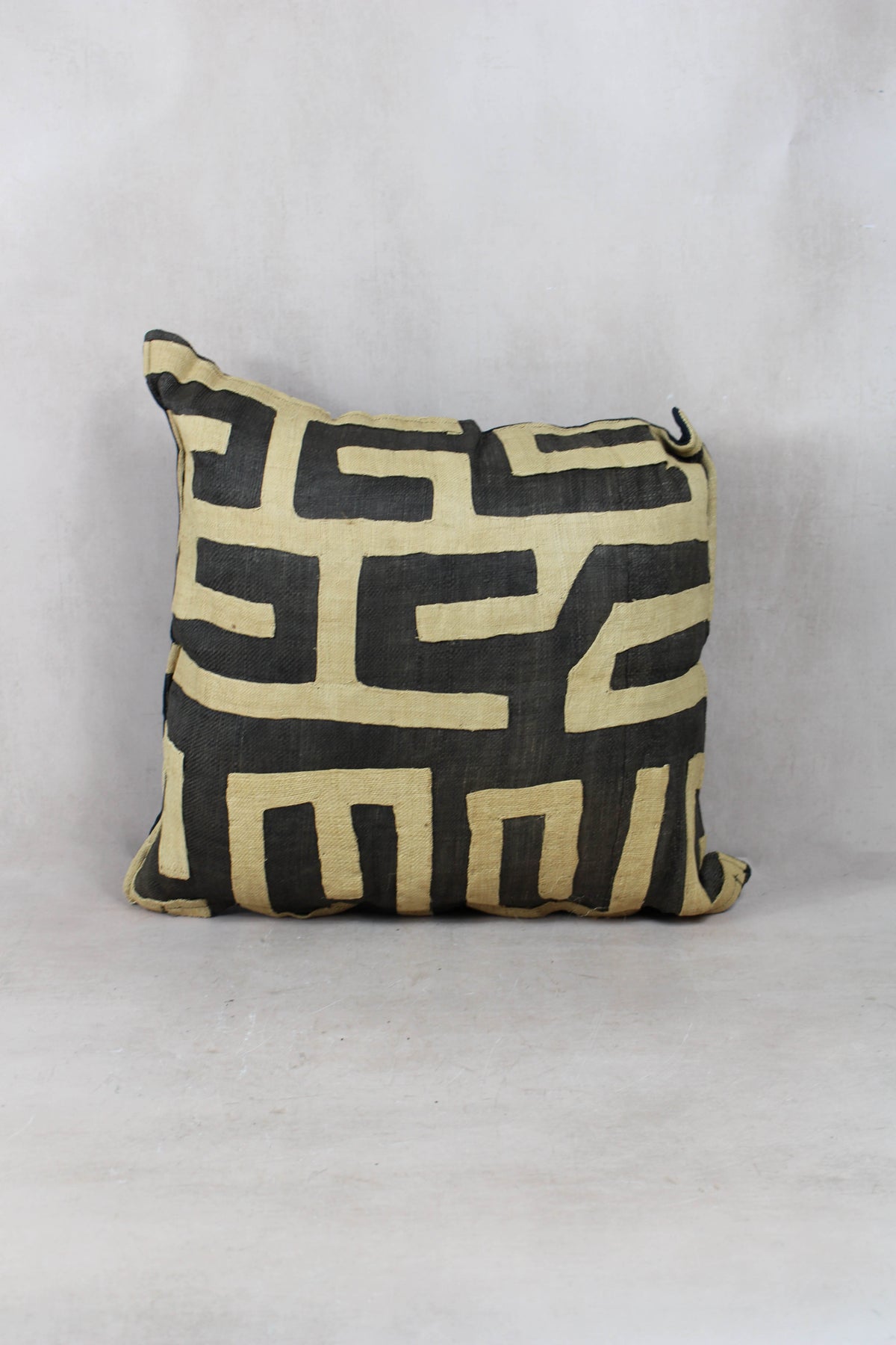 Vintage Kuba cloth cushion — geometric raffia detail