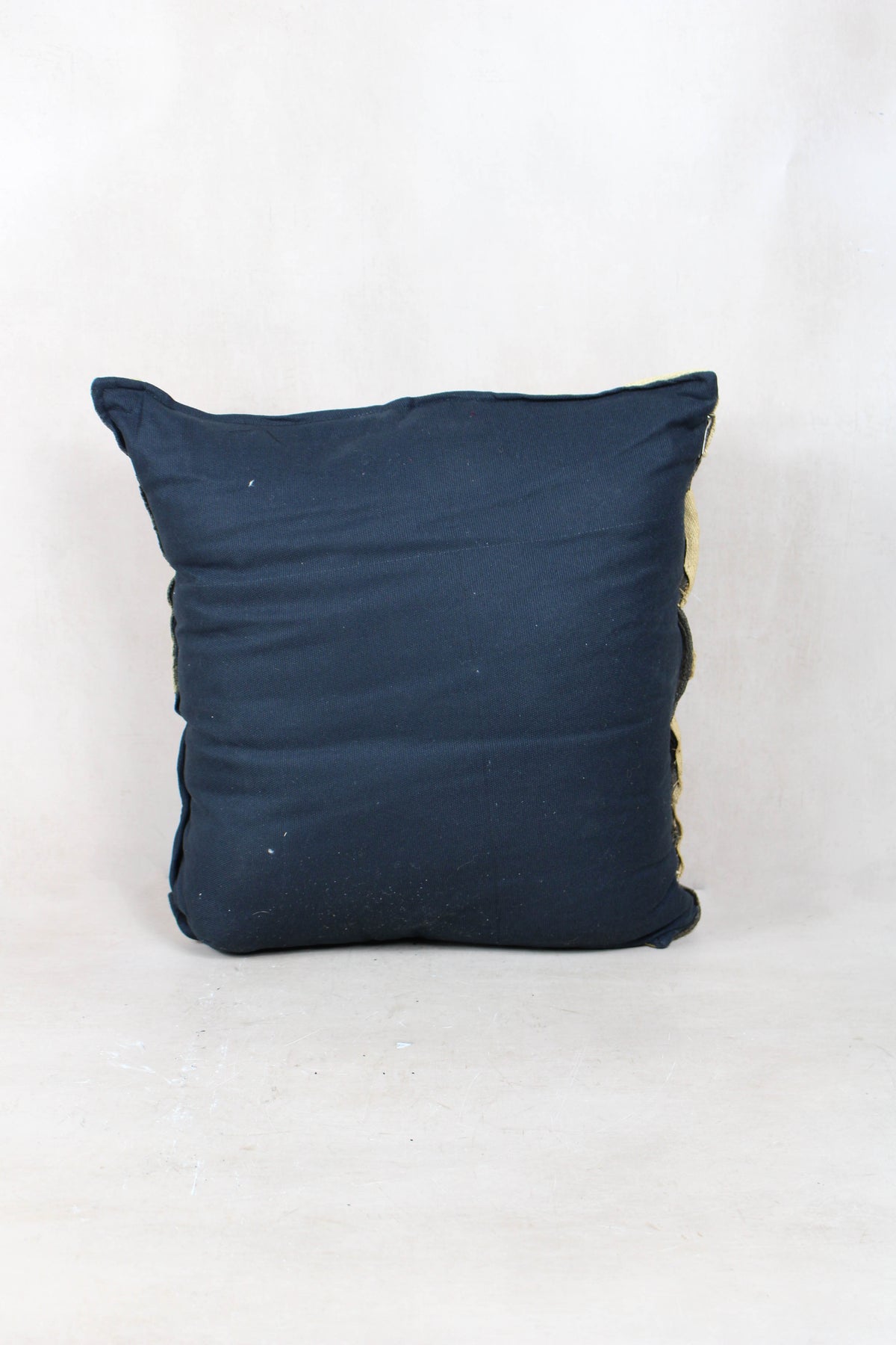 Vintage Kuba cloth cushion — reverse