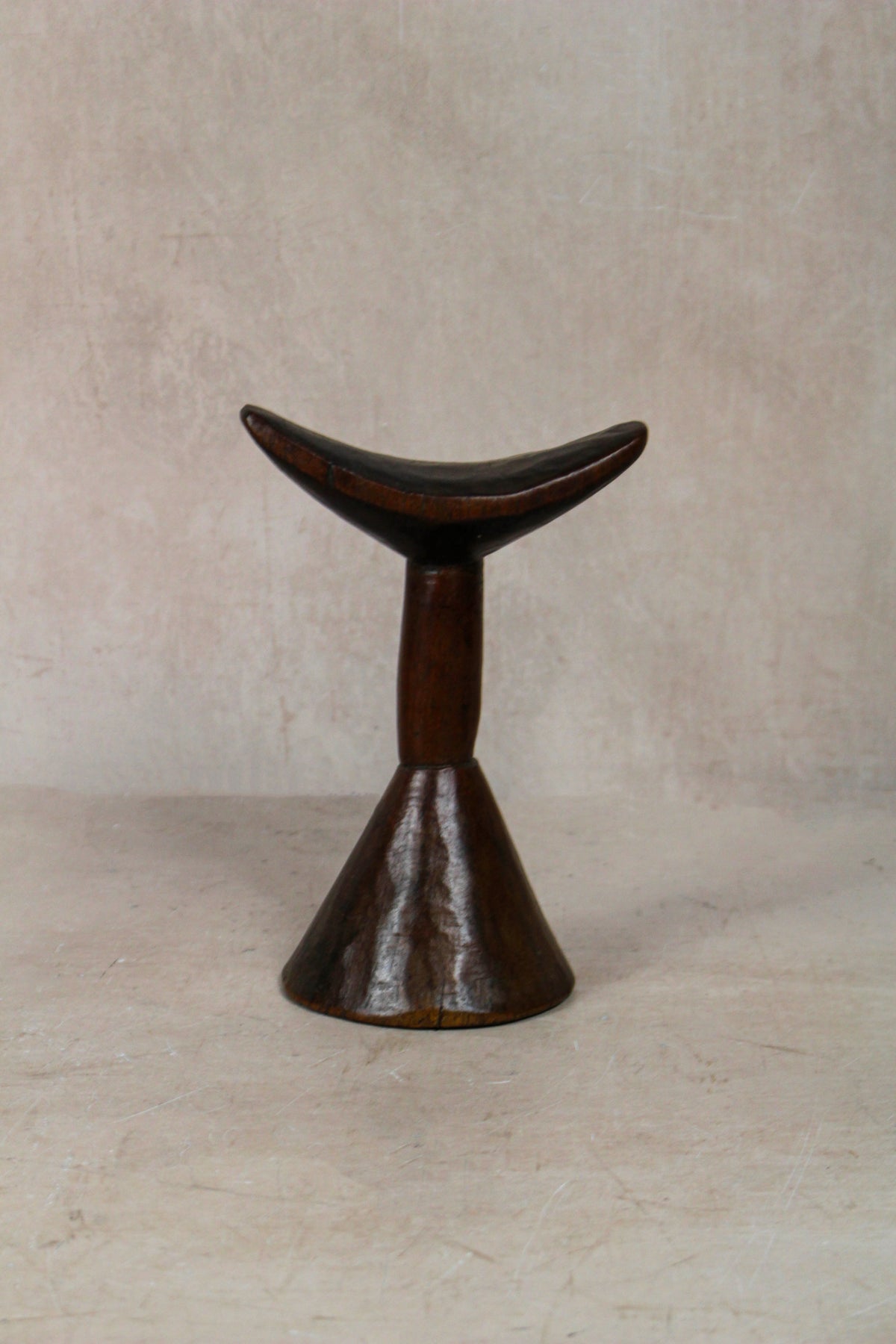 Vintage hand-carved Ethiopian wooden headrest in dark wood, sculptural African artefact (23.5)