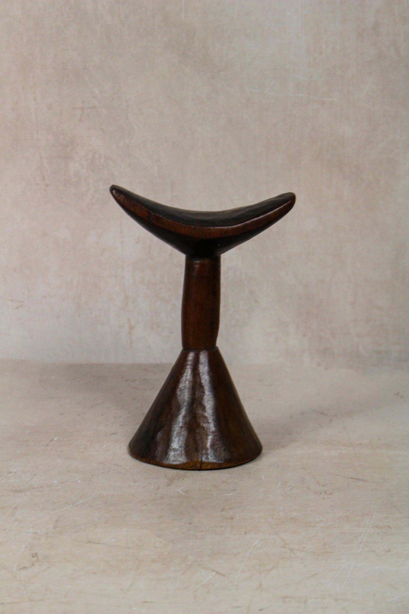 Vintage hand-carved Ethiopian wooden headrest in dark wood, sculptural African artefact (23.5)