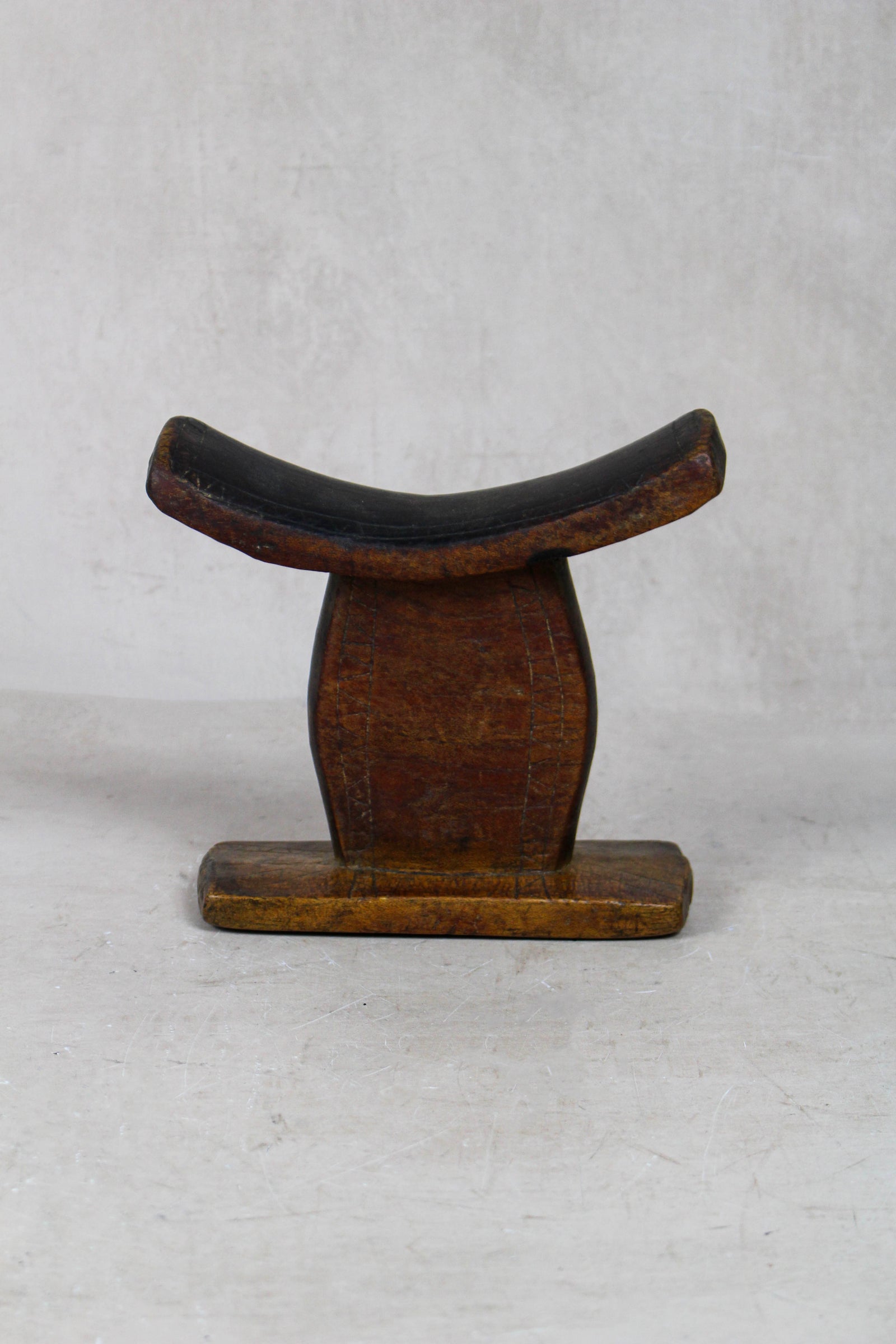 Vintage hand-carved Ethiopian wooden headrest in dark wood, sculptural African artefact (23.9)