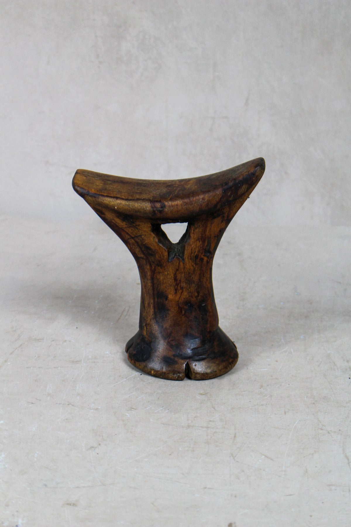 Vintage hand-carved Ethiopian wooden headrest in dark wood, sculptural African artefact (24.2b)