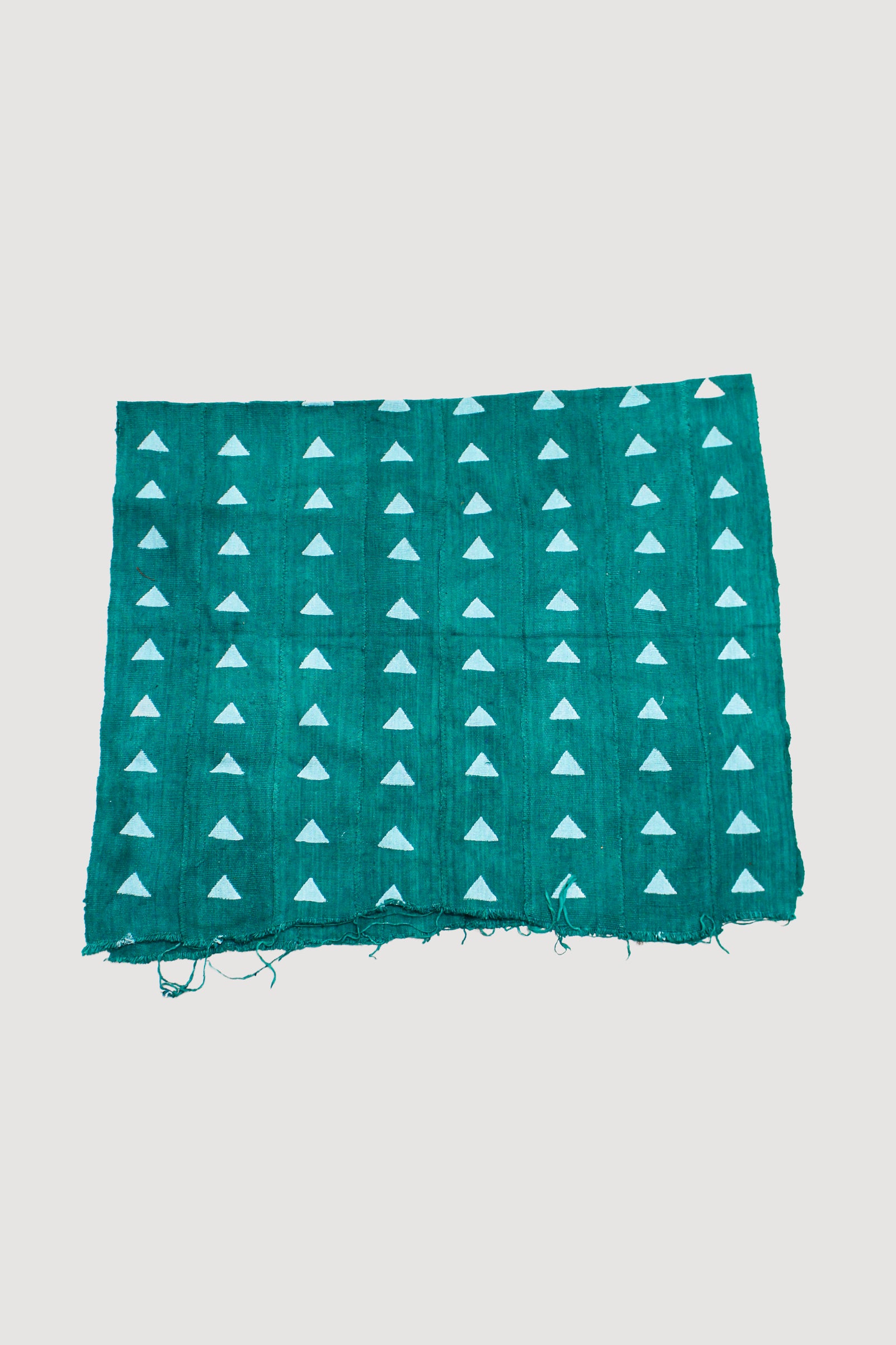 Handwoven Malian Bogolan mud cloth with natural mud-dye patterns