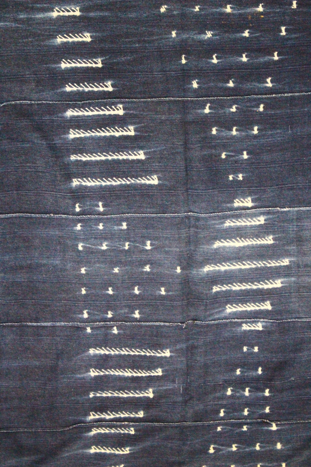 Indigo adire cloth — full length laid flat