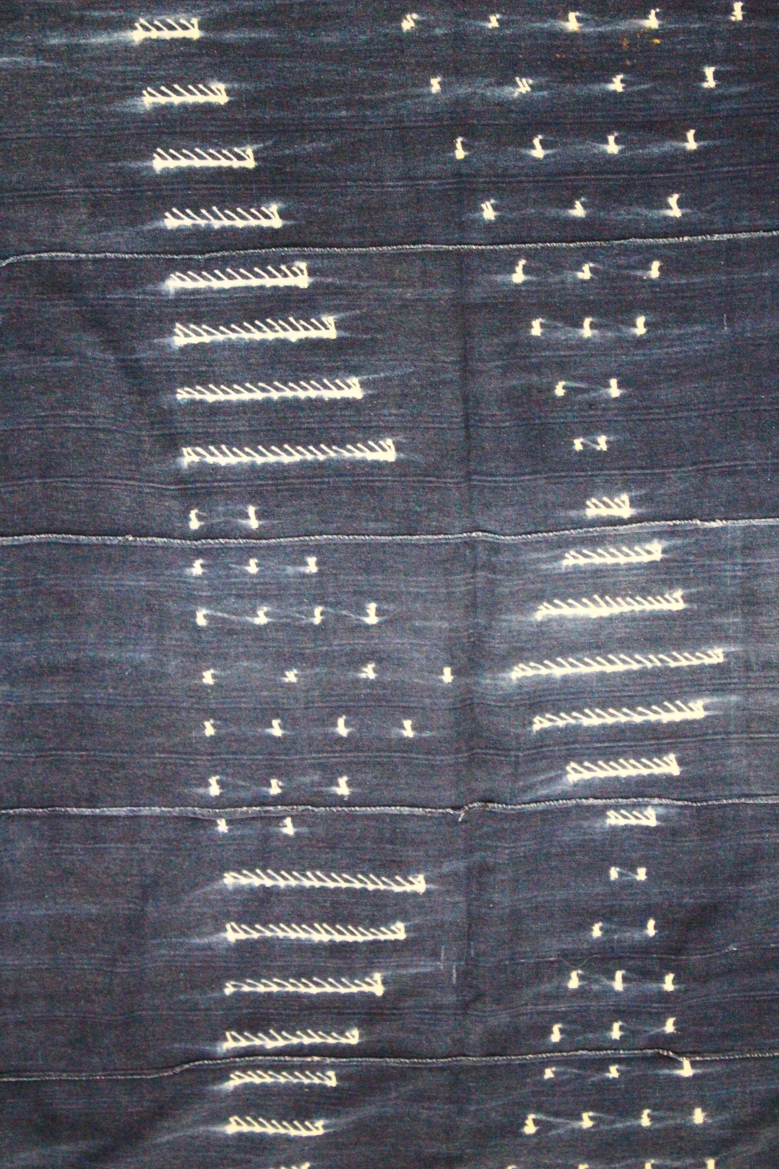 Indigo adire cloth — full length laid flat