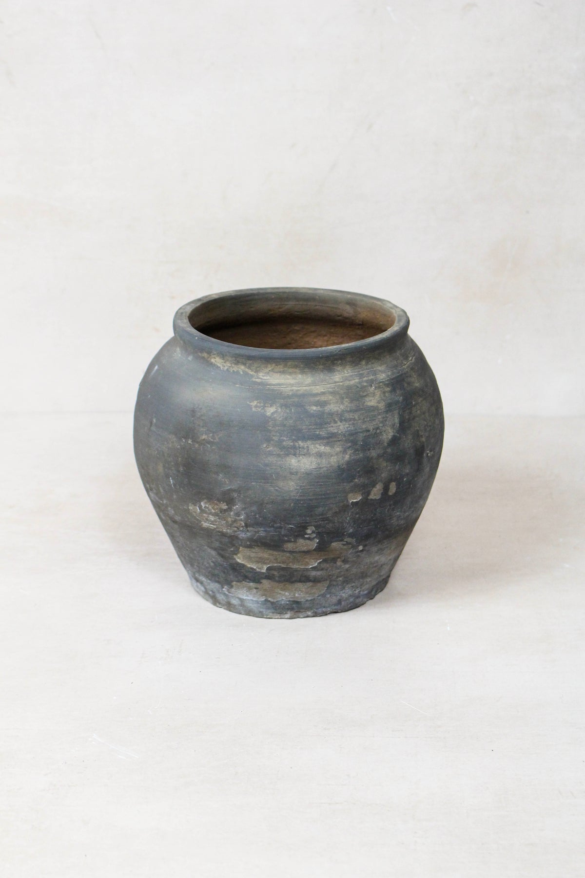 Small vintage dark unglazed earthenware pot from Shanxi, China