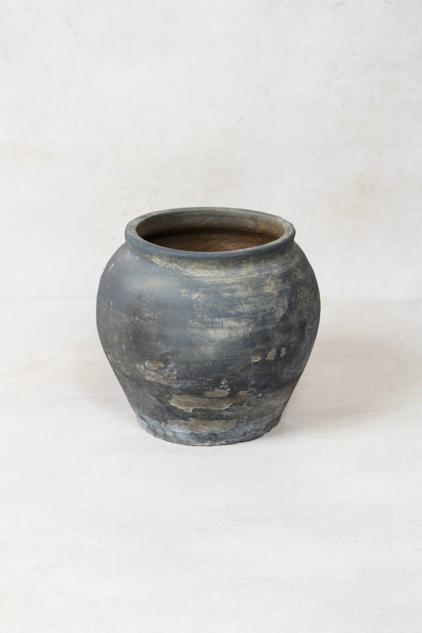 Small vintage dark unglazed earthenware pot from Shanxi, China