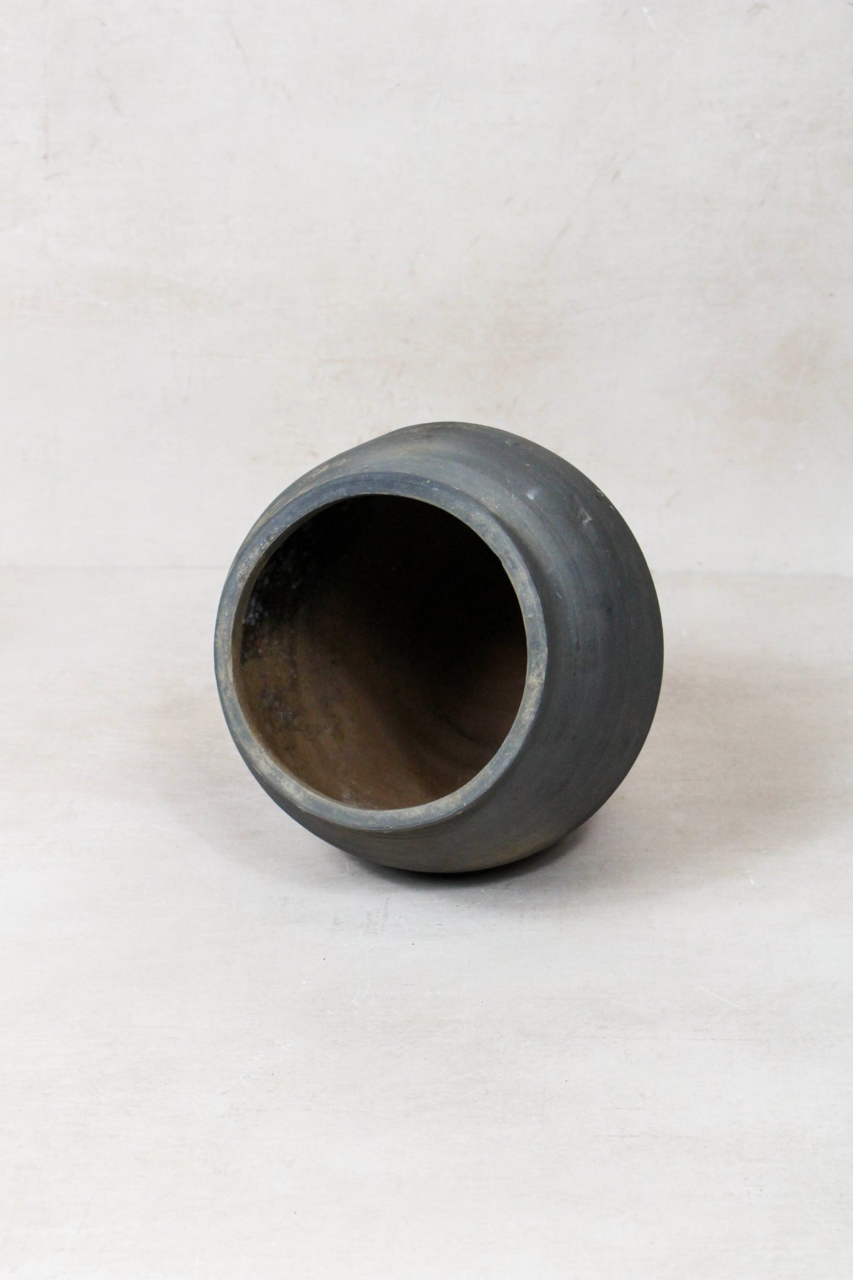Vintage dark pot — opening from above