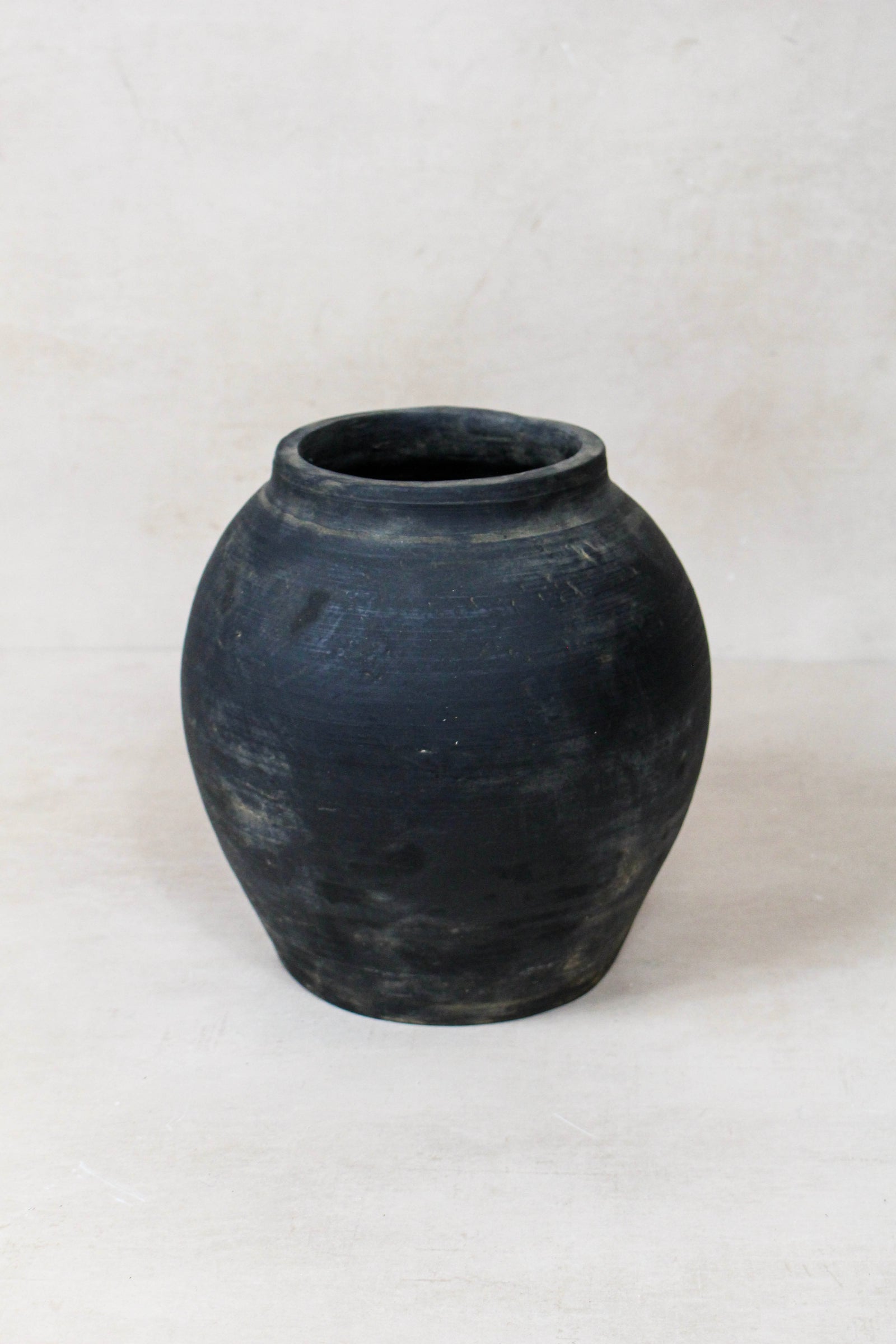 Small vintage dark unglazed earthenware pot from Shanxi, China
