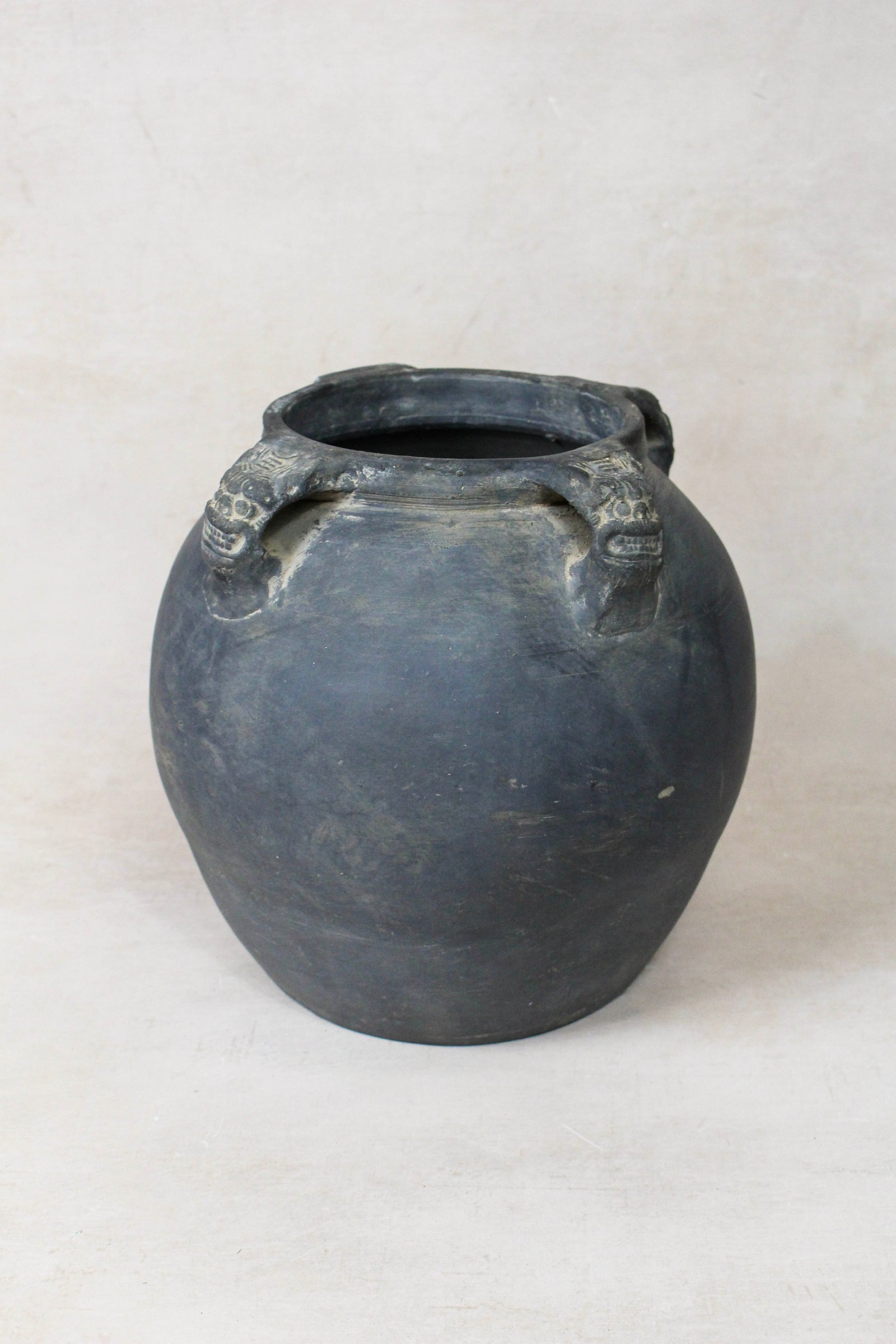Vintage dark unglazed earthenware pot with lion-ear handles from Shanxi, China