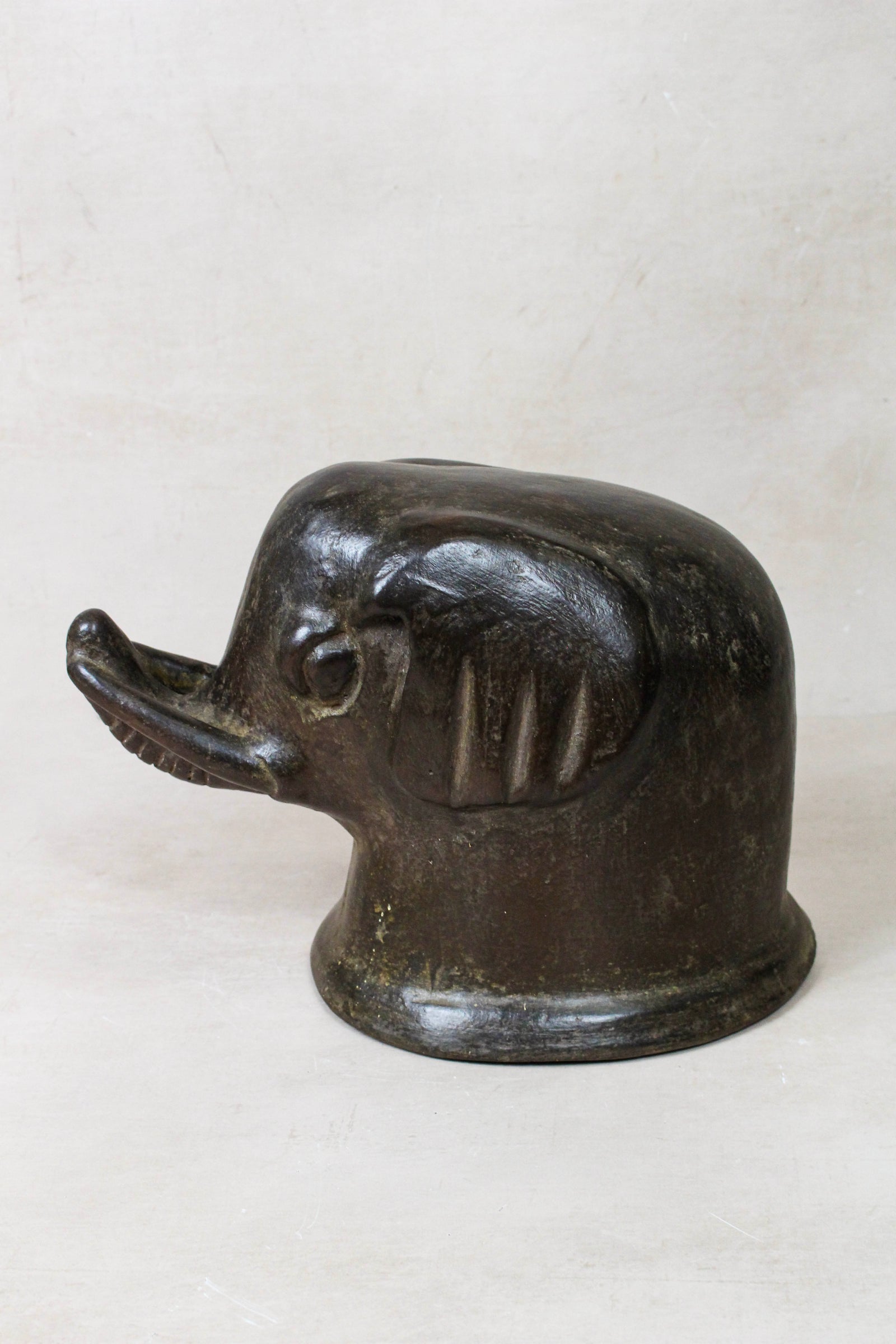 Mangbetu elephant head sculpture in burnished terracotta with an obsidian-like patina