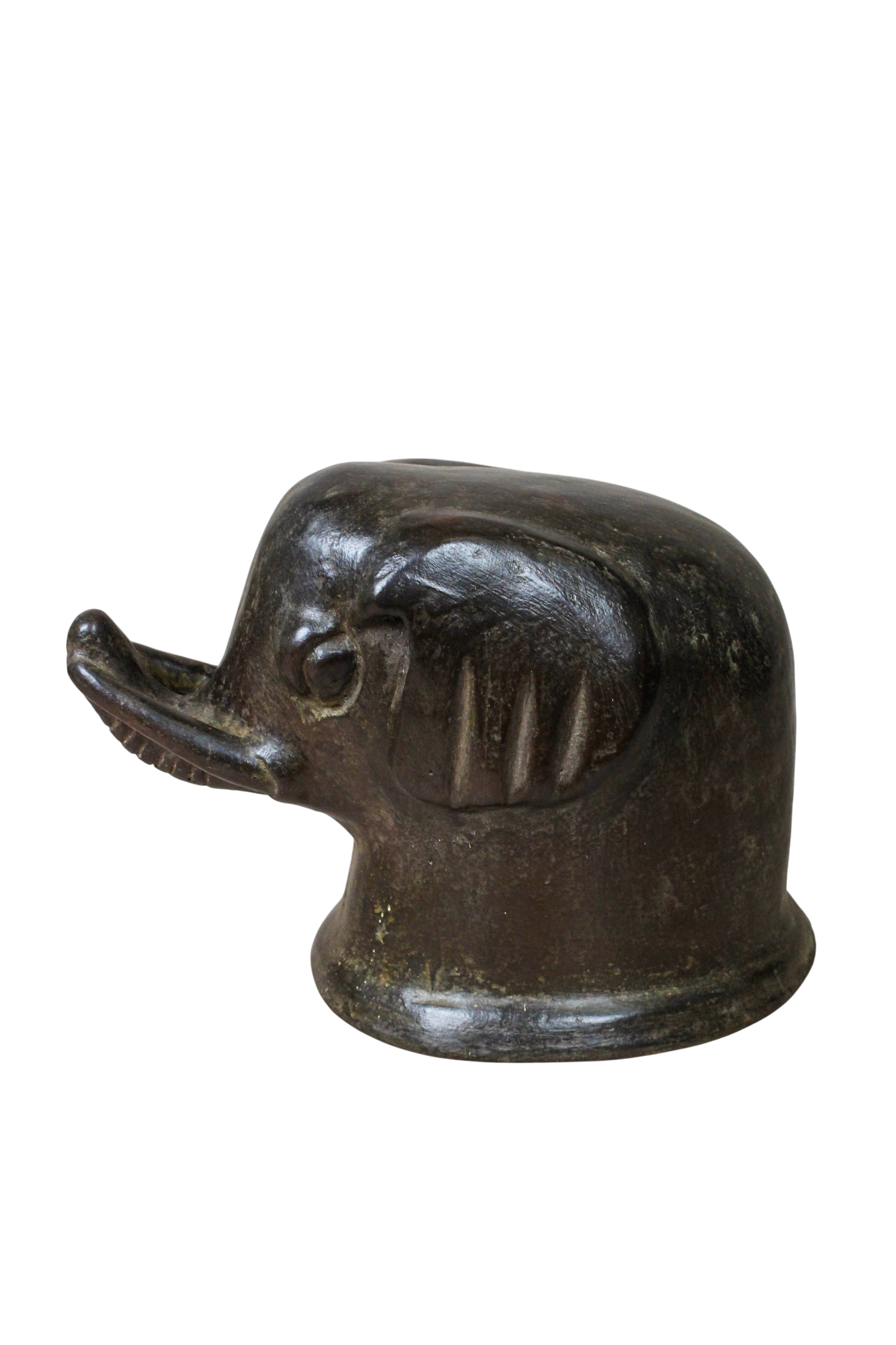 Mangbetu terracotta elephant head sculpture on a plain background
