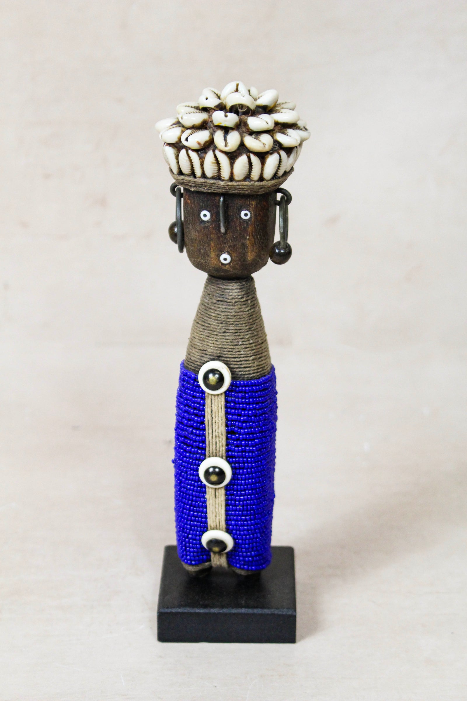 Hand-carved dark blue beaded Namji doll from Cameroon
