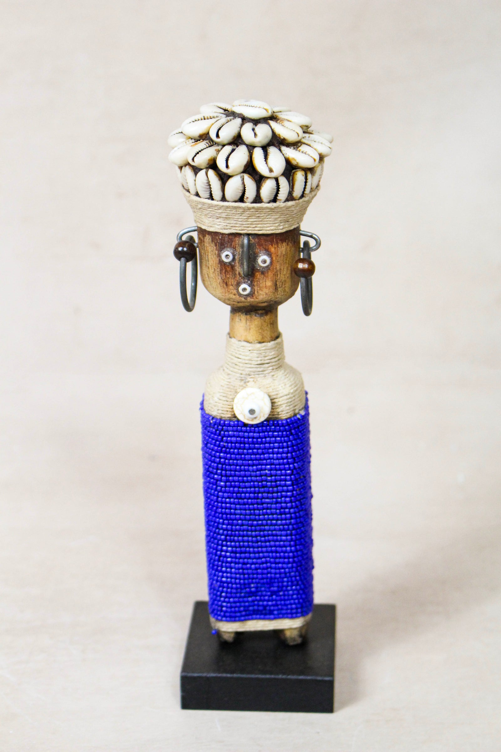 Hand-carved dark blue beaded Namji doll from Cameroon