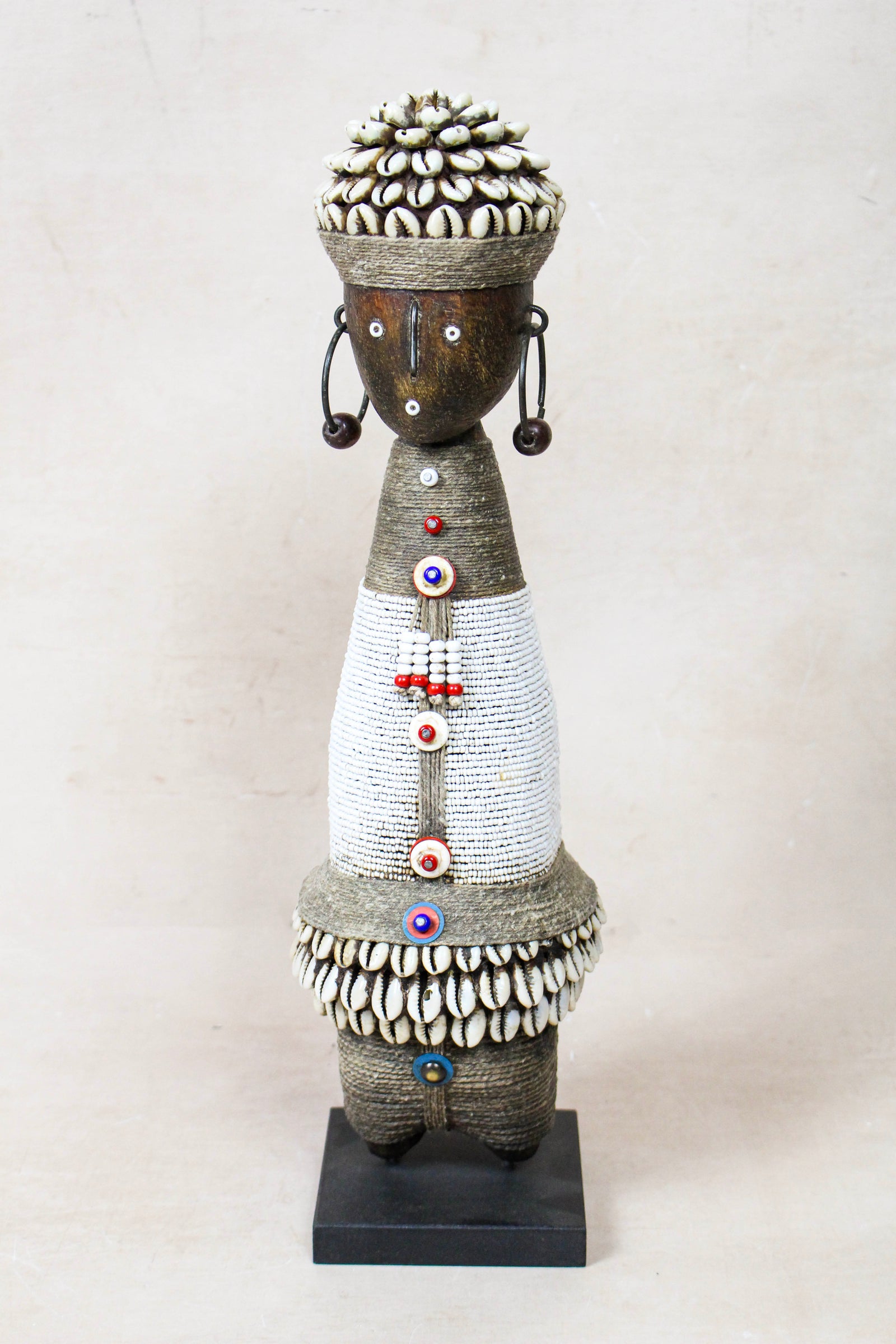 Hand-carved white beaded Namji doll from Cameroon
