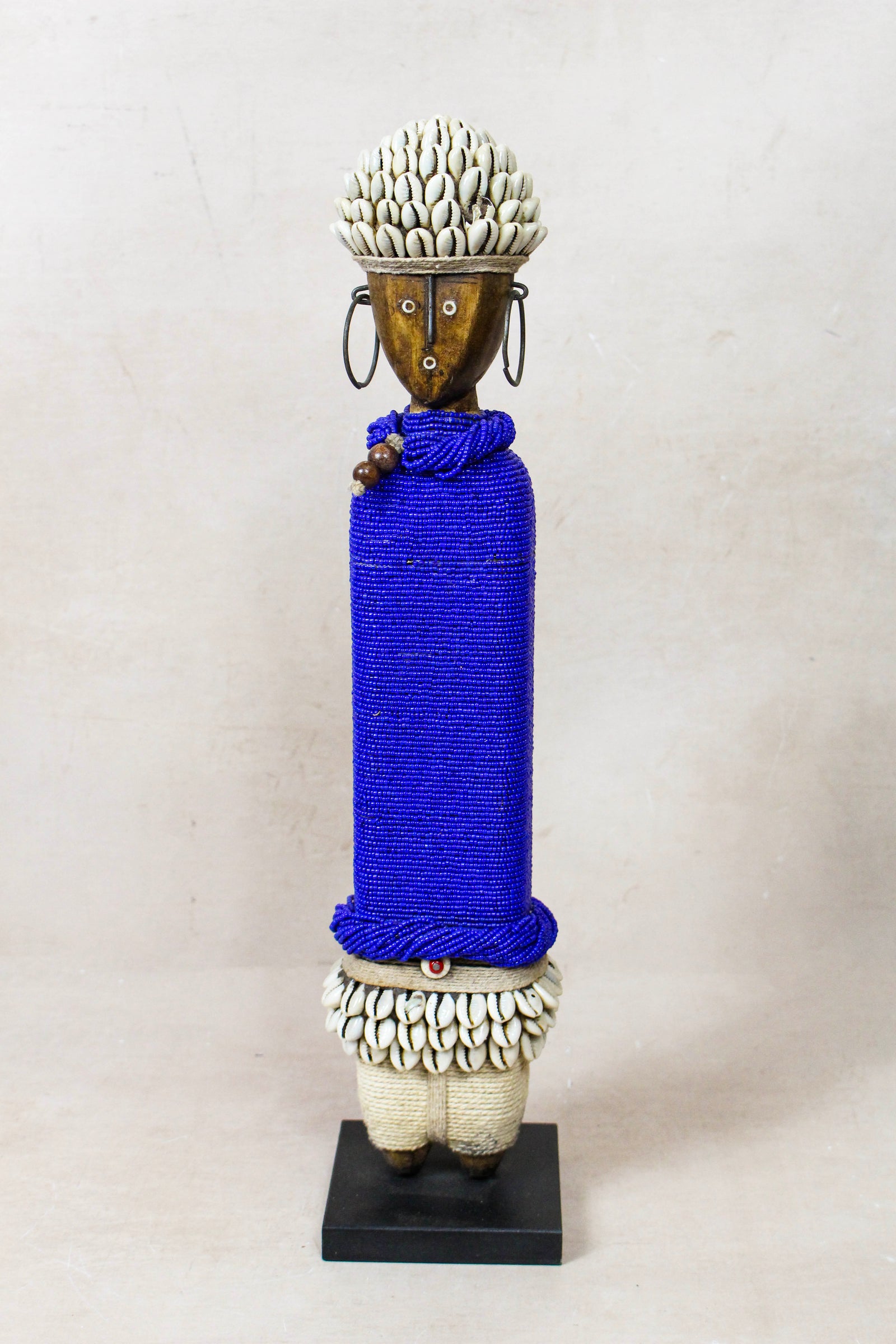 Hand-carved dark blue beaded Namji doll from Cameroon