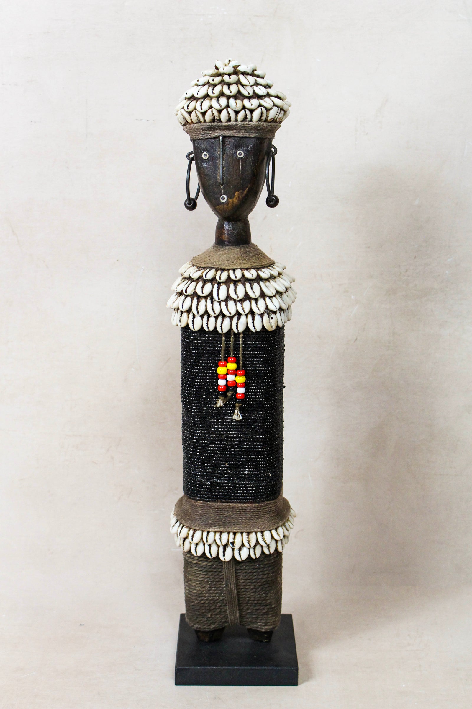 Hand-carved black beaded Namji doll from Cameroon