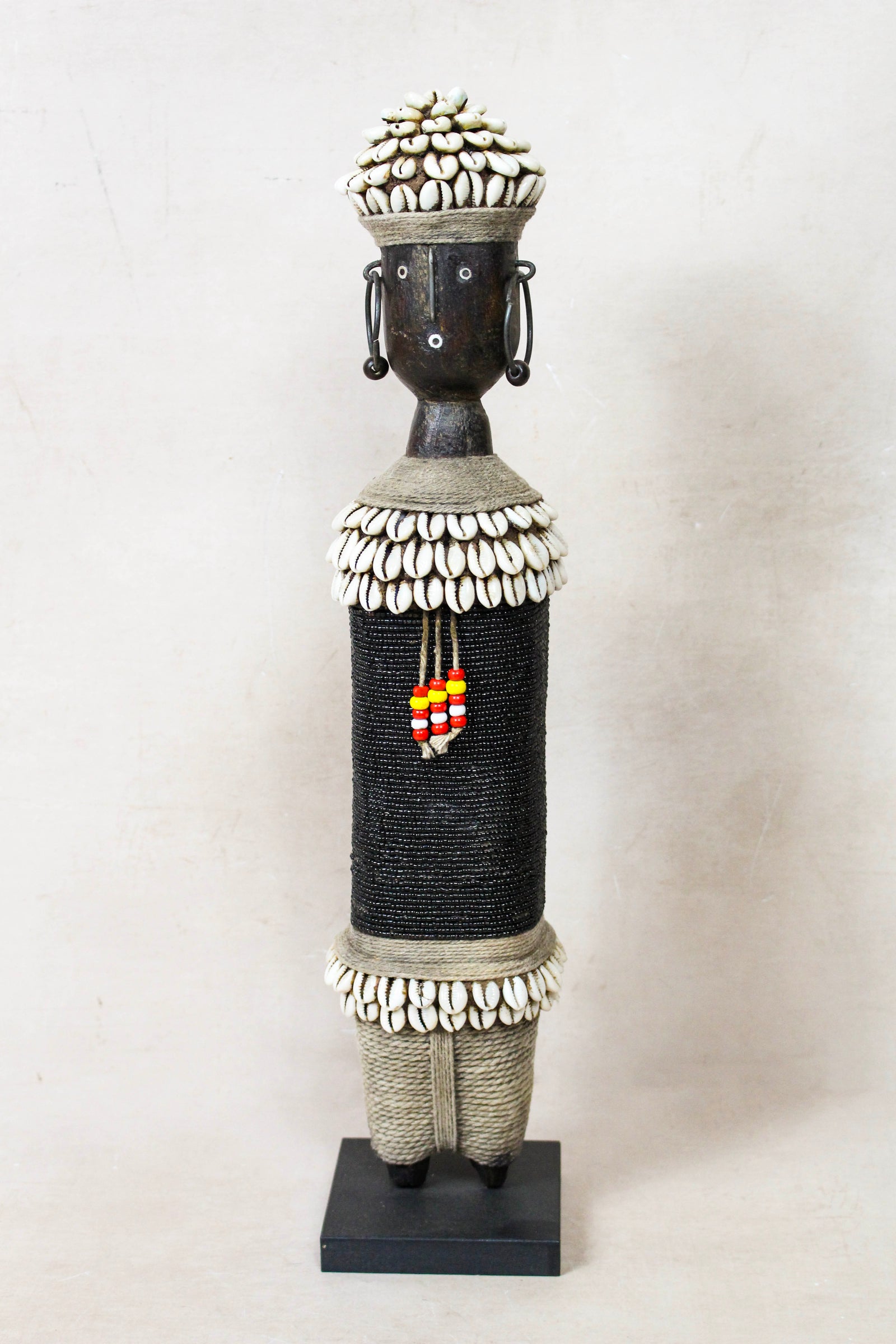 Hand-carved black beaded Namji doll from Cameroon