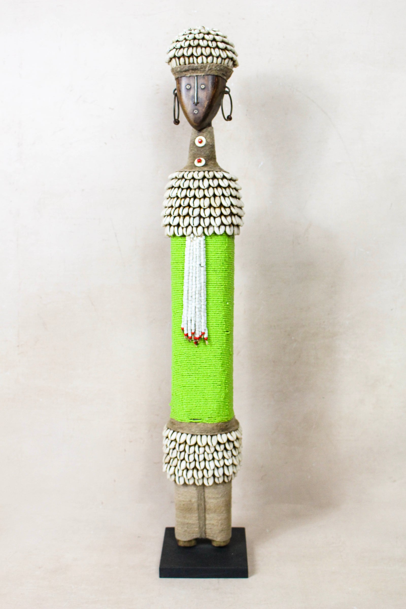 Large hand-carved green beaded Namji doll from Cameroon