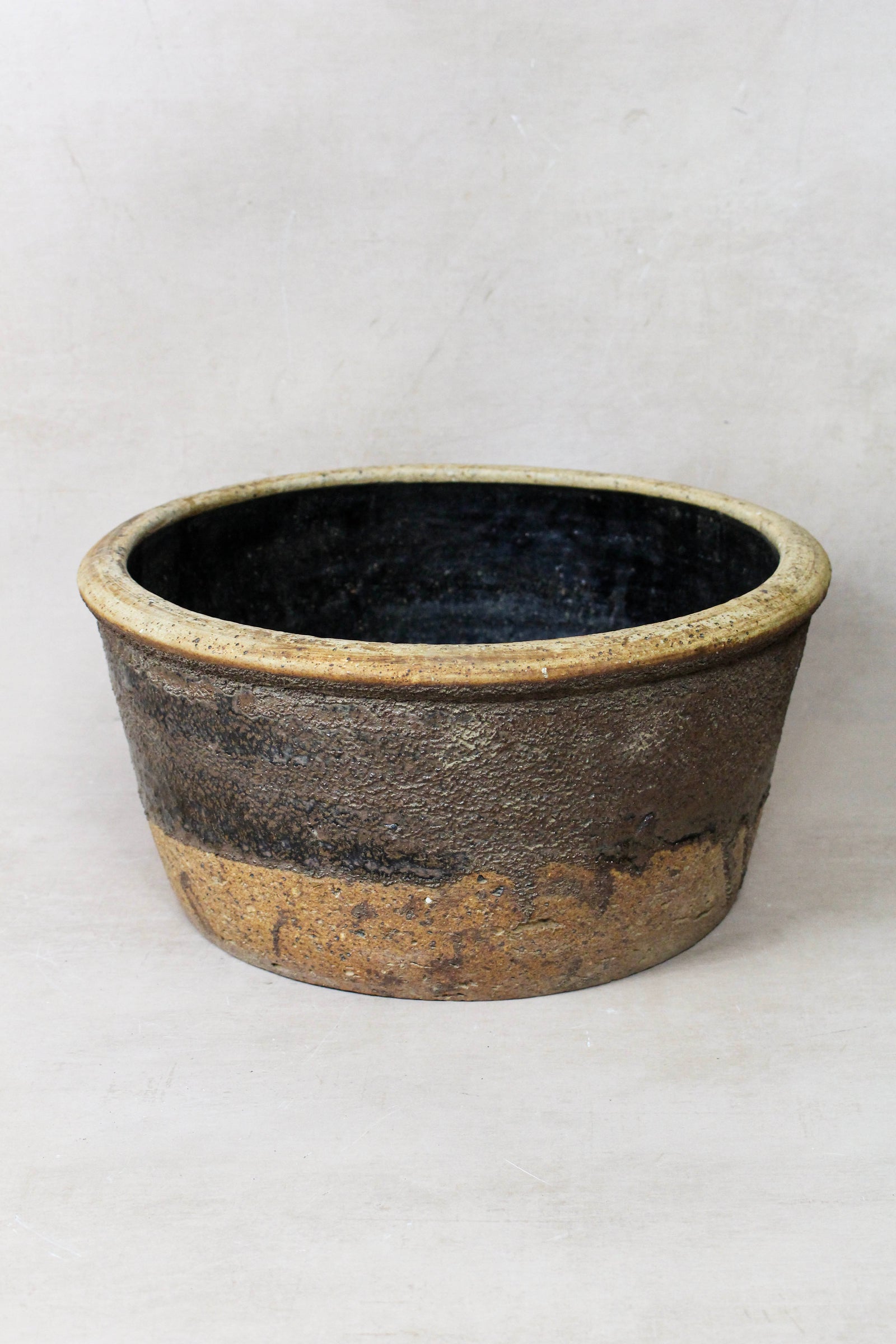 Small antique dark glazed terracotta wabi-sabi bowl from rural China