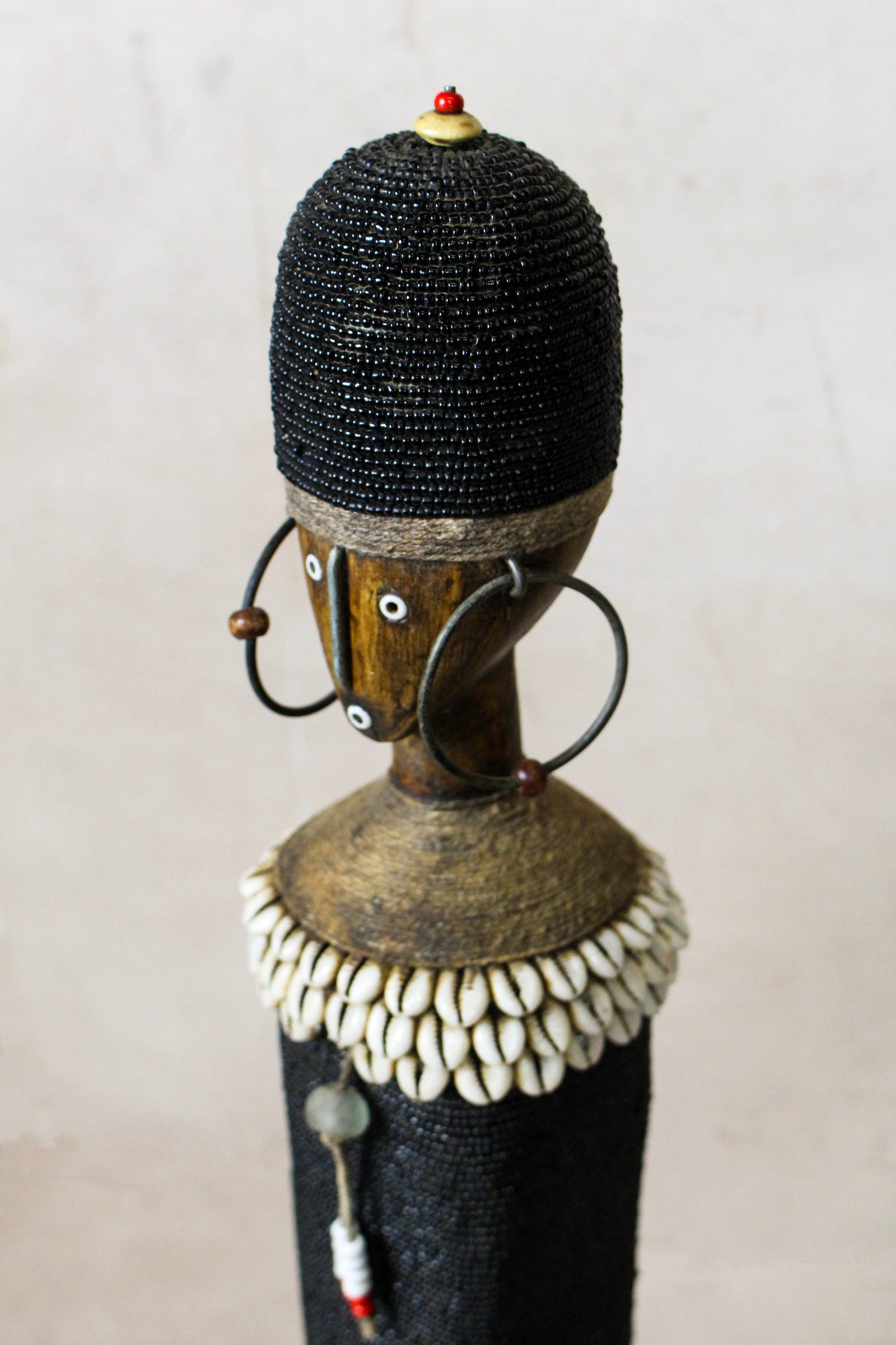Black Namji beaded doll — side view