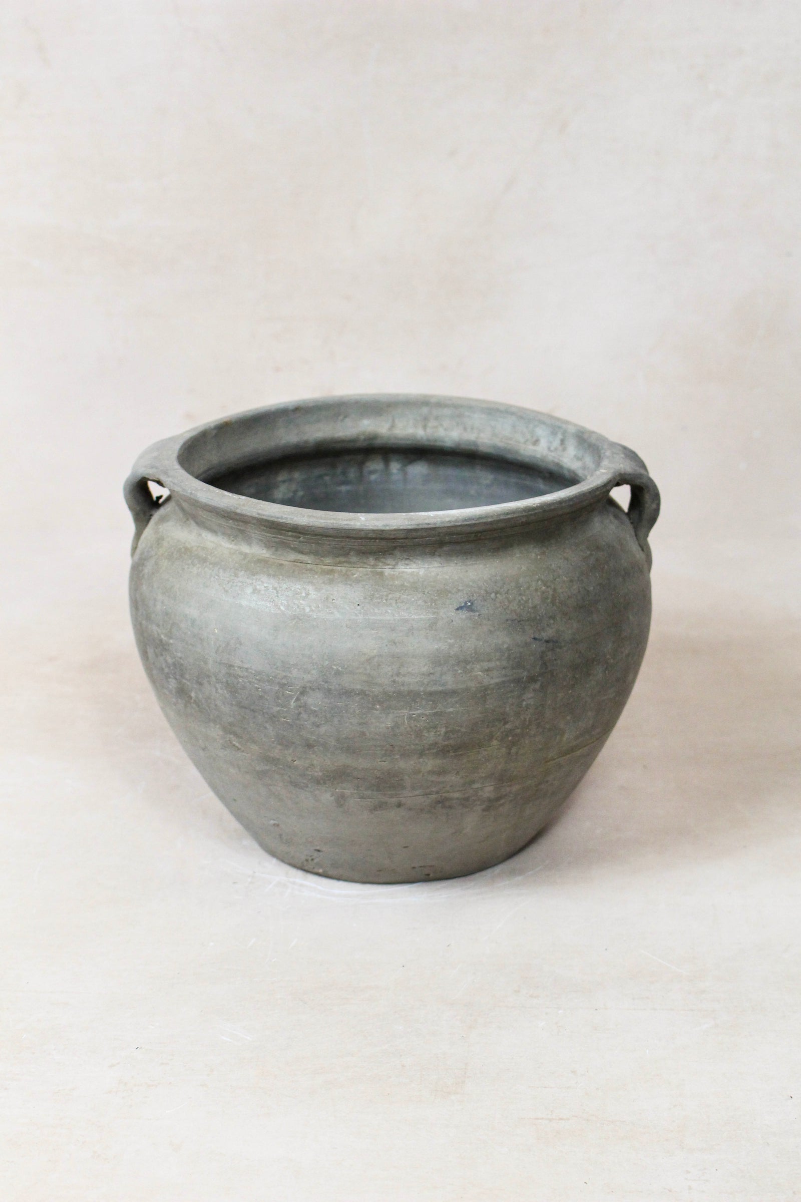 Small vintage dark unglazed earthenware pot from Shanxi, China