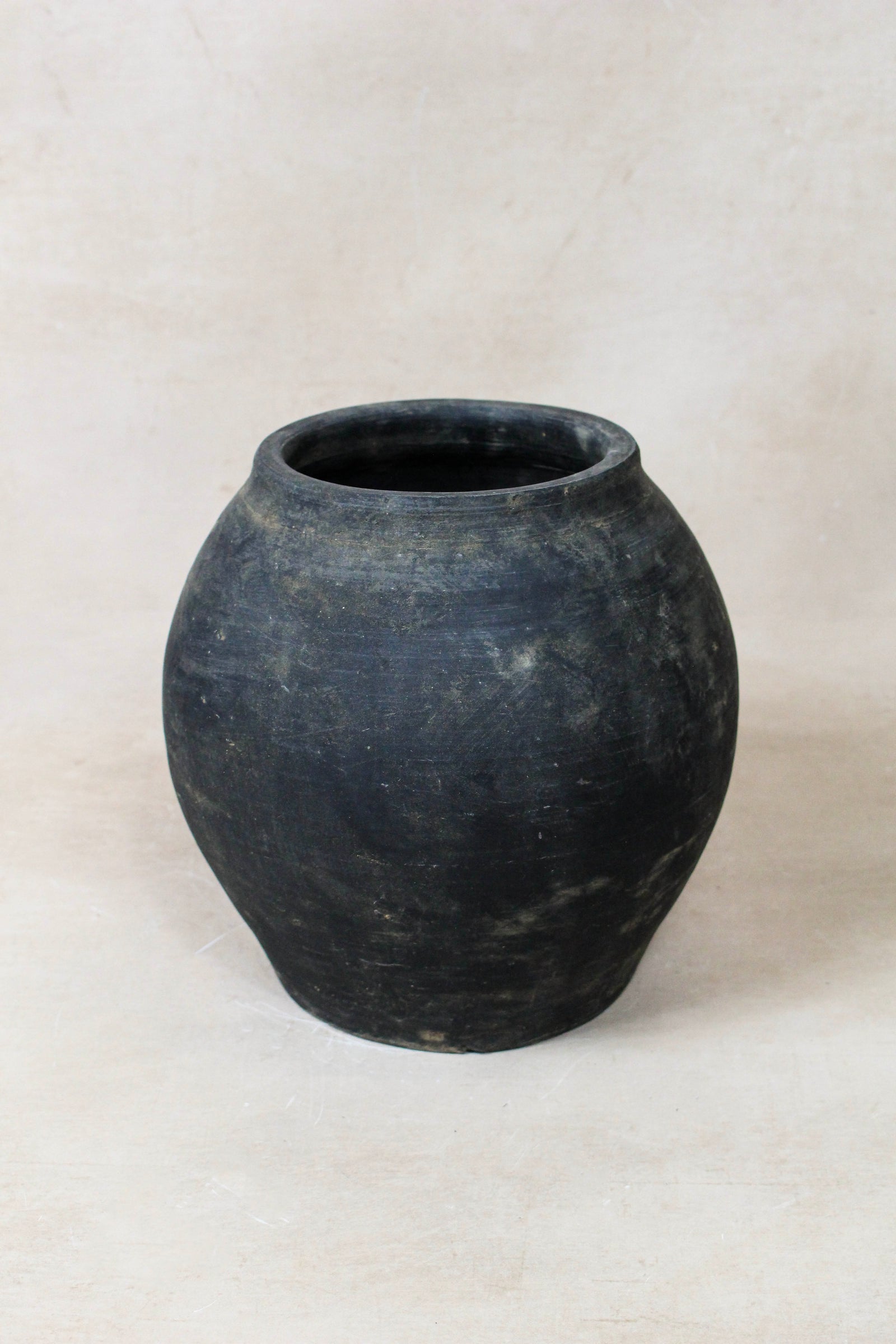 Small vintage dark unglazed earthenware pot from Shanxi, China