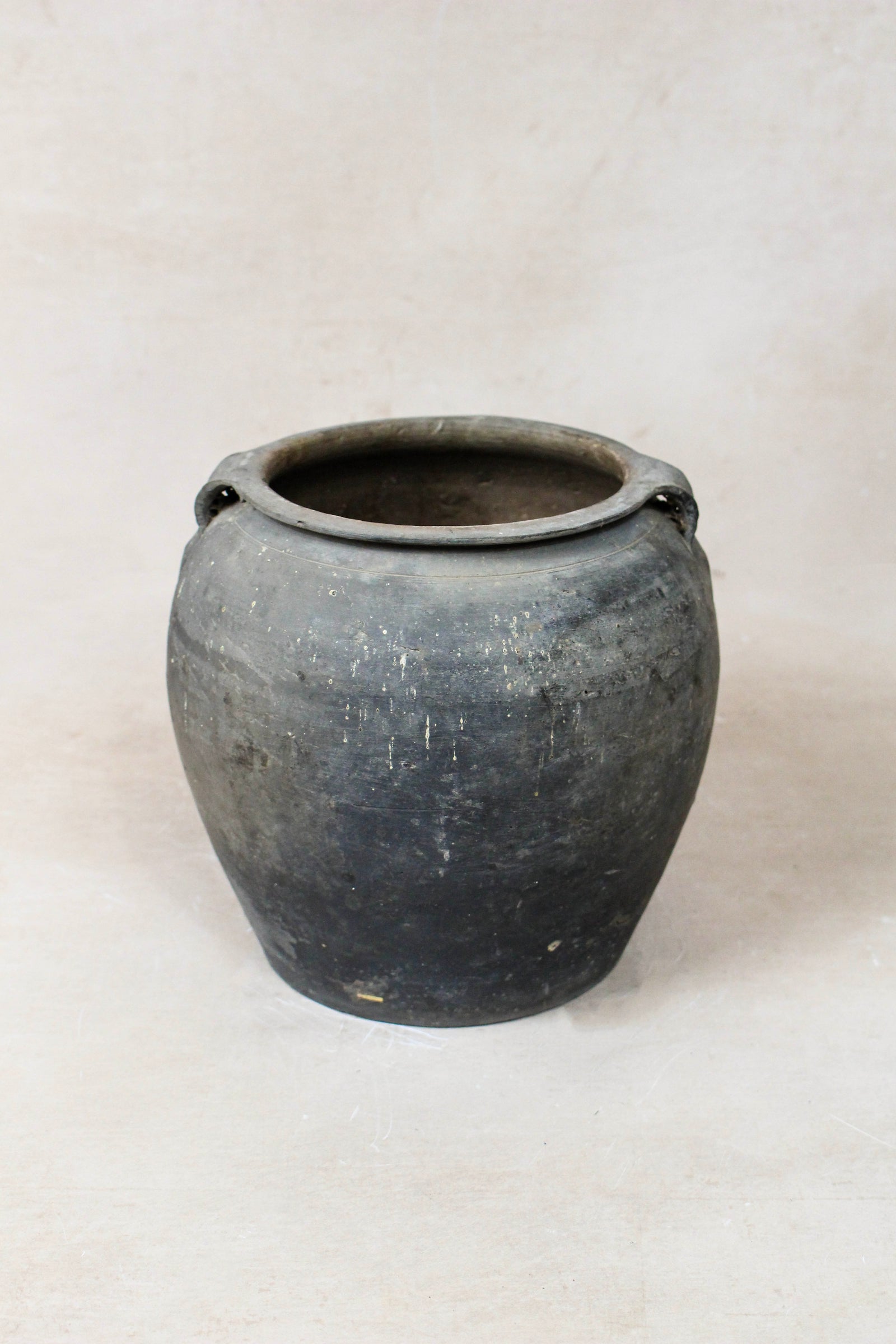 Small vintage dark unglazed earthenware pot from Shanxi, China