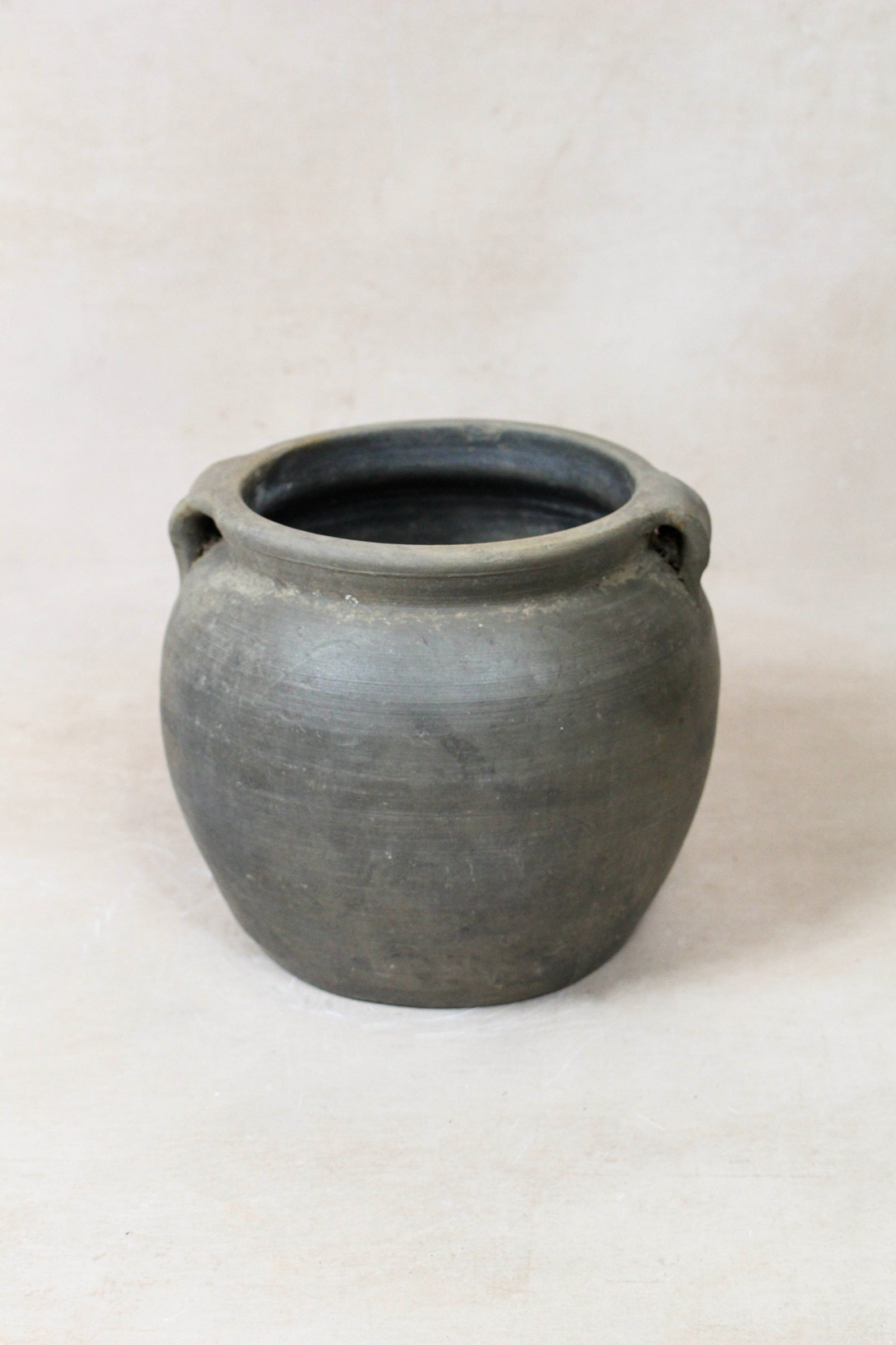 Small vintage dark unglazed earthenware pot from Shanxi, China