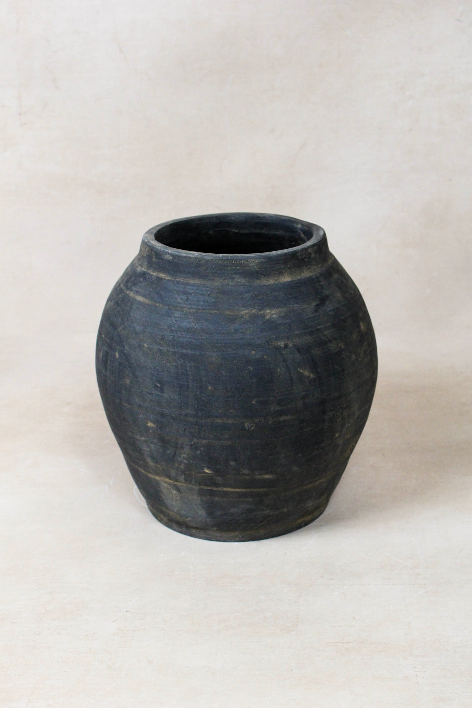Small vintage dark unglazed earthenware pot from Shanxi, China