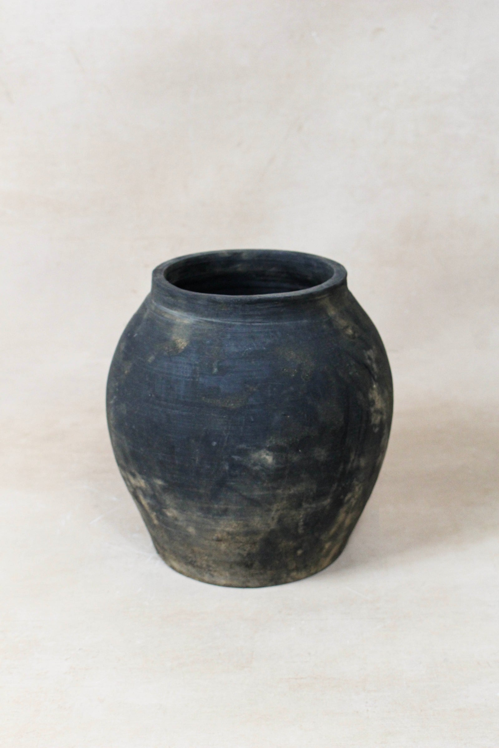 Small vintage dark unglazed earthenware pot from Shanxi, China
