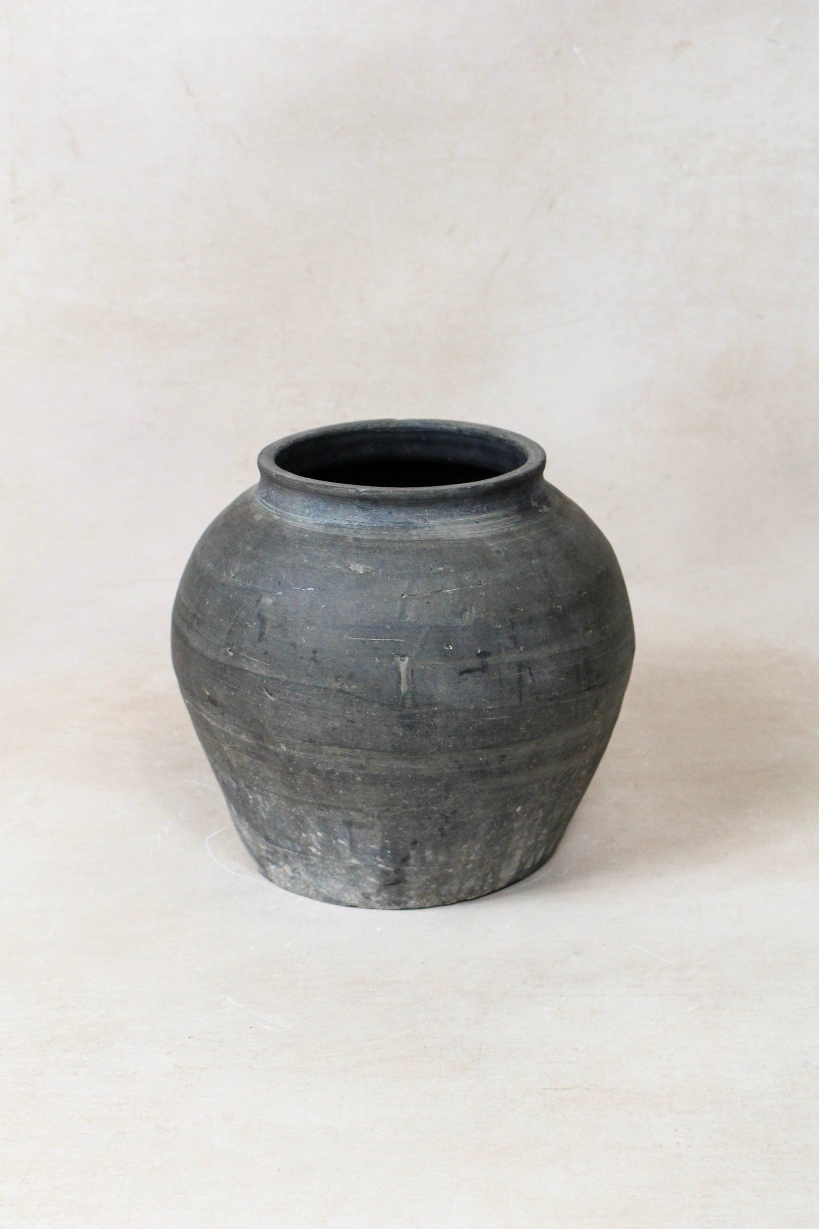 Small vintage dark unglazed earthenware pot from Shanxi, China