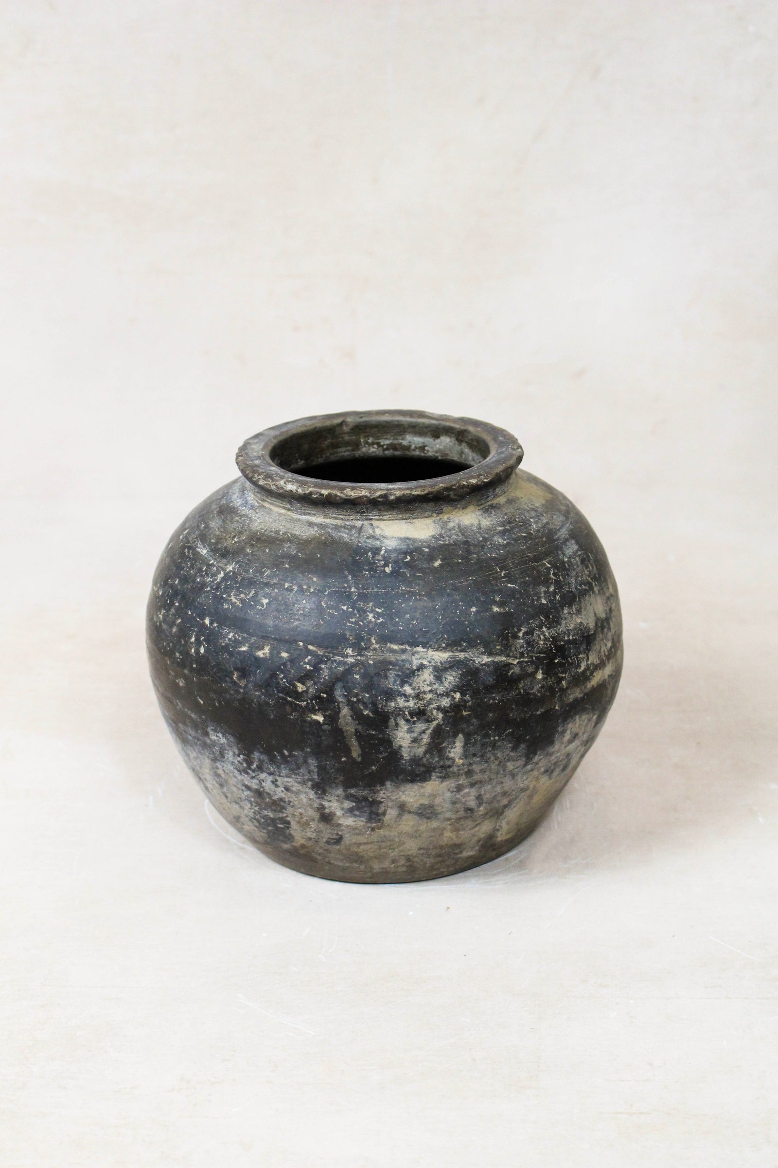 Small vintage dark unglazed earthenware pot from Shanxi, China