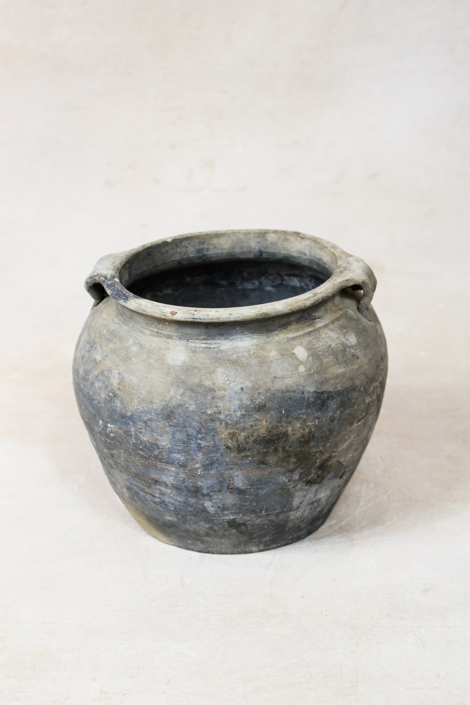 Small vintage dark unglazed earthenware pot from Shanxi, China