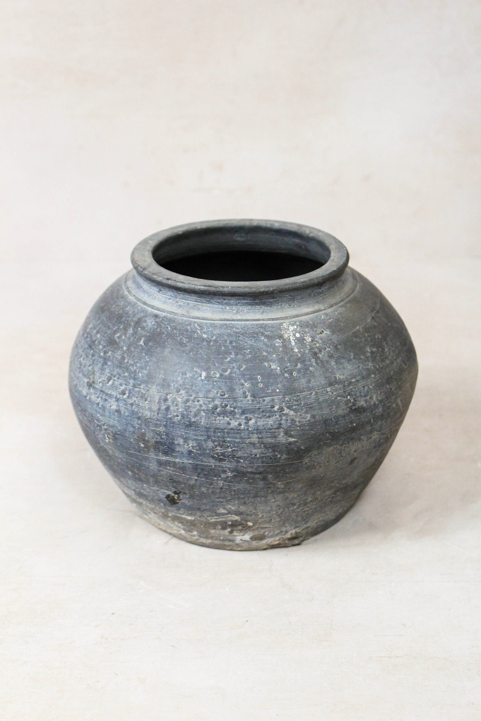 Small vintage dark unglazed earthenware pot from Shanxi, China