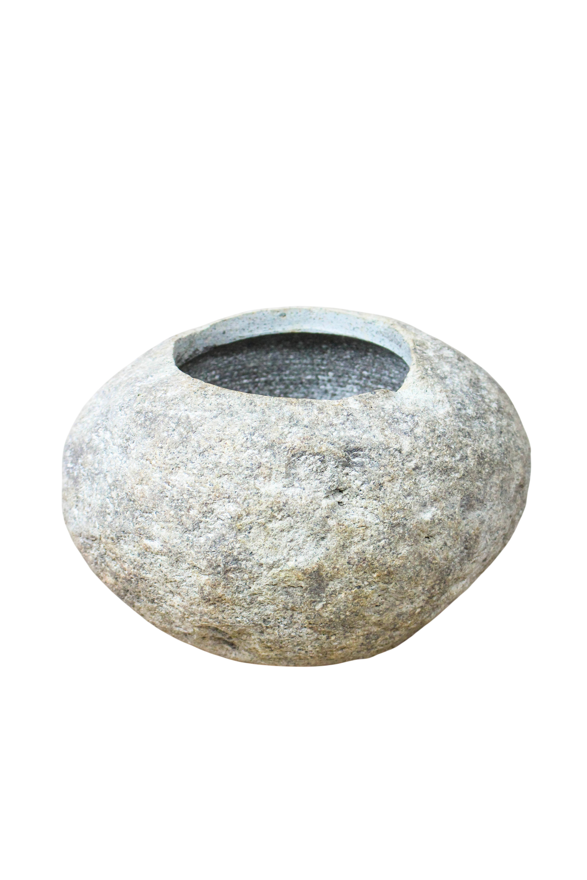 Planter hollowed by hand from a single smooth river stone, for direct planting