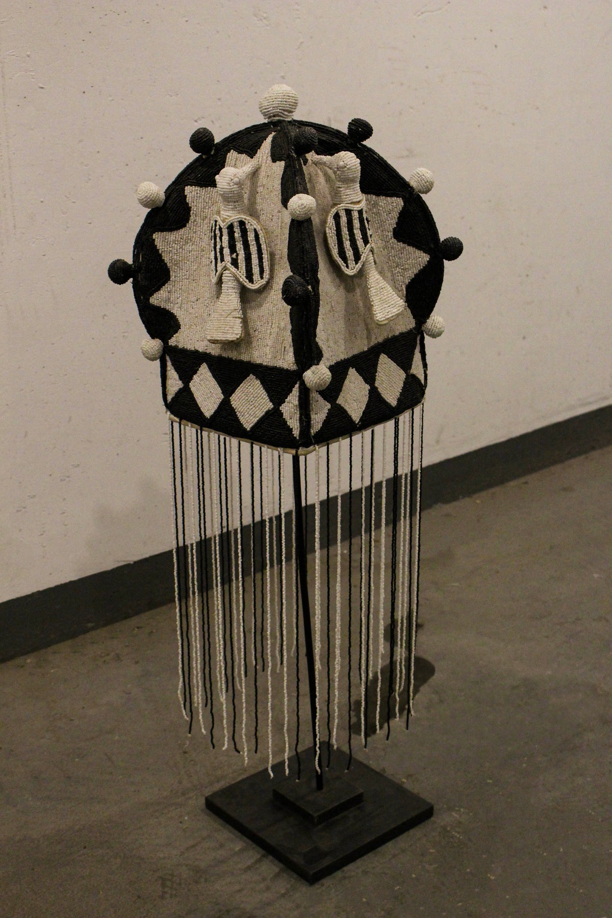 Yoruba royal beaded crown in black and white, side view