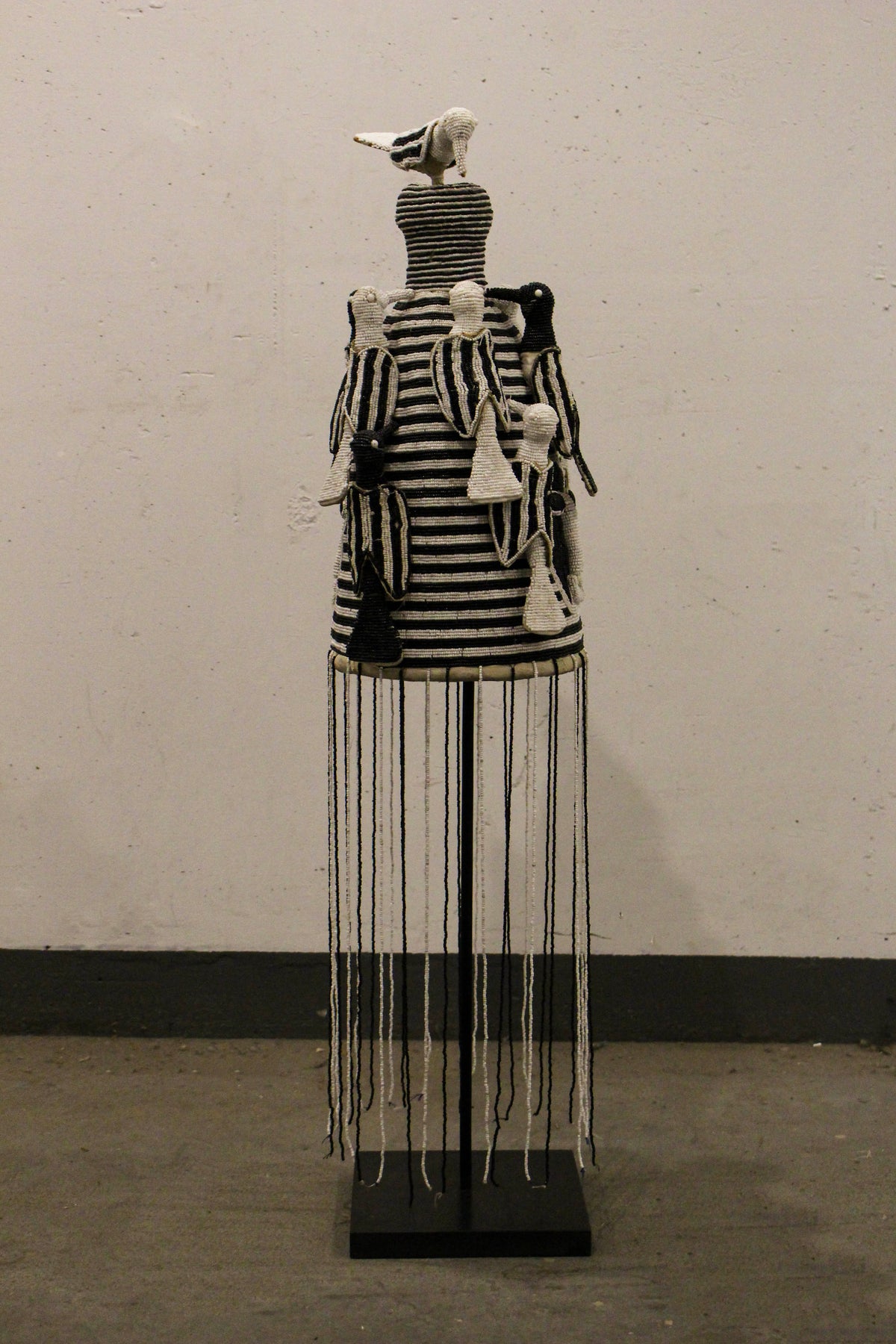 Yoruba royal beaded crown in black and white, side view