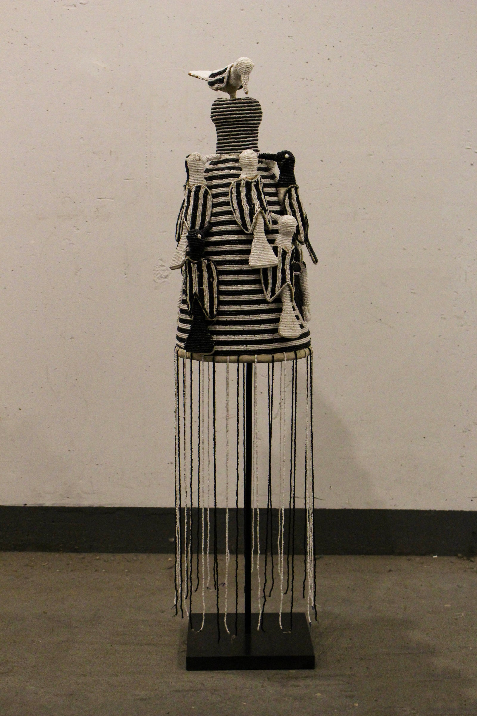 Yoruba royal beaded crown in black and white, side view