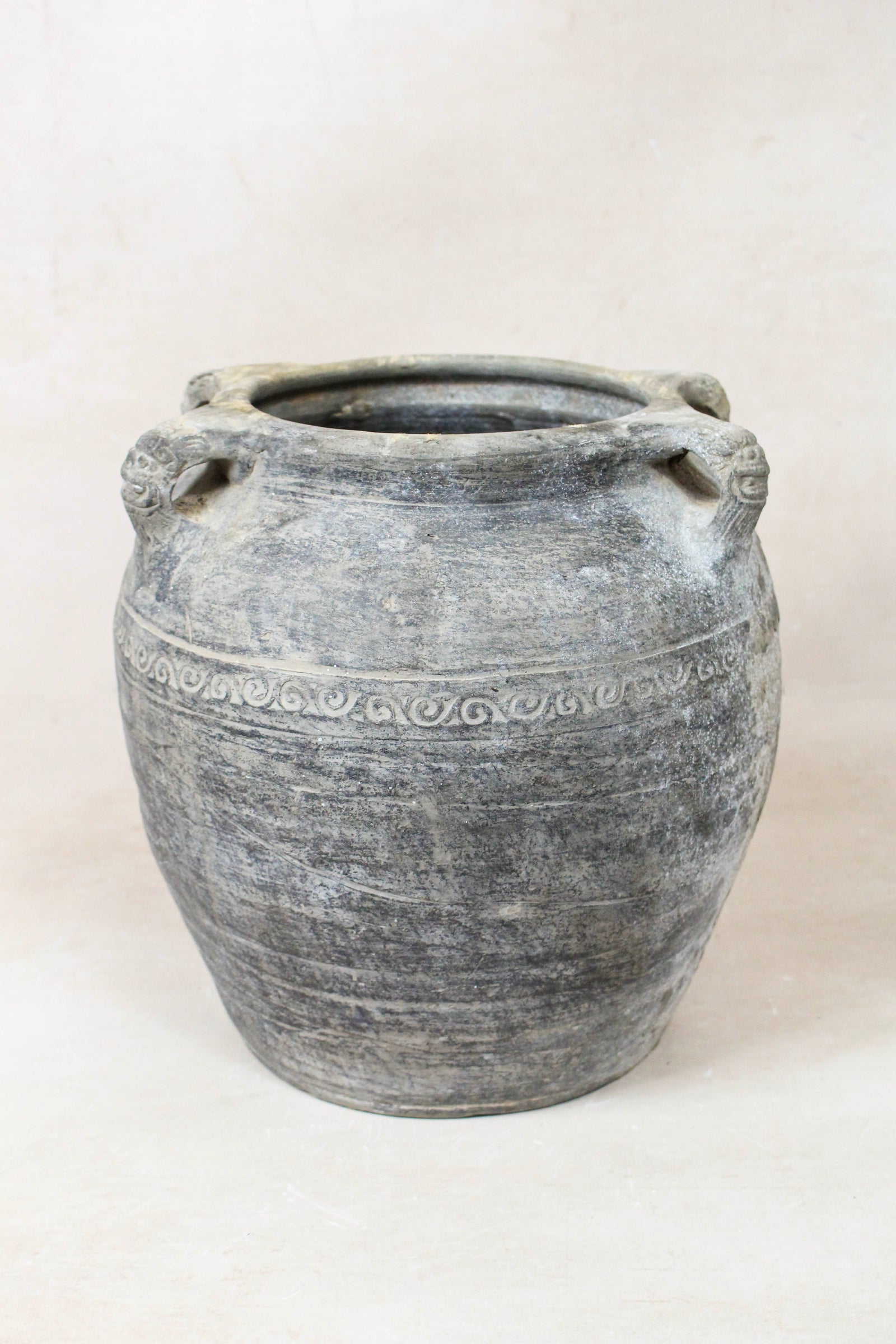 Vintage dark unglazed earthenware pot with lion-ear handles from Shanxi, China