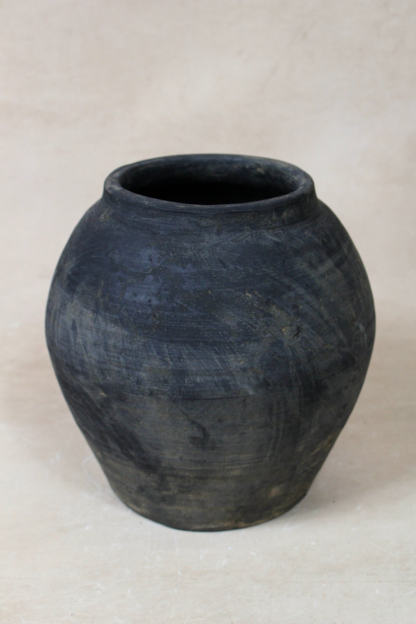Small vintage dark unglazed earthenware pot from Shanxi, China