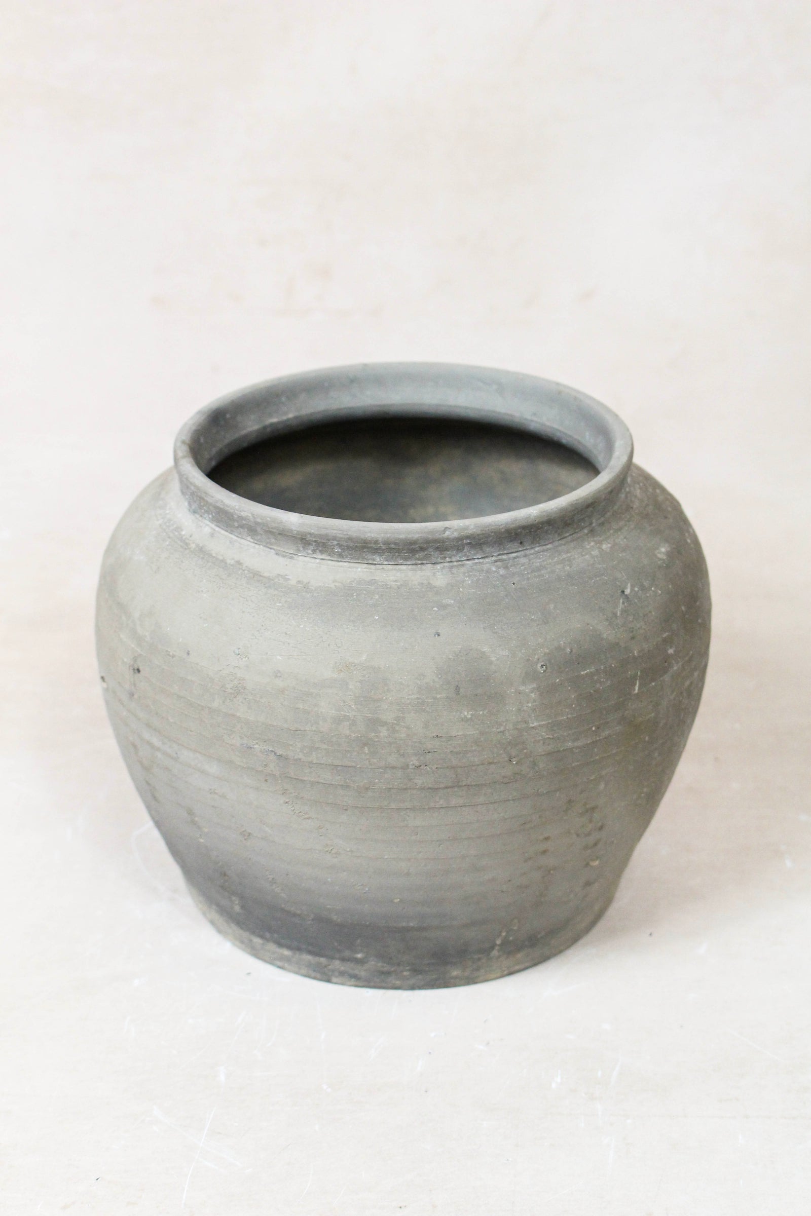 Small vintage dark unglazed earthenware pot from Shanxi, China