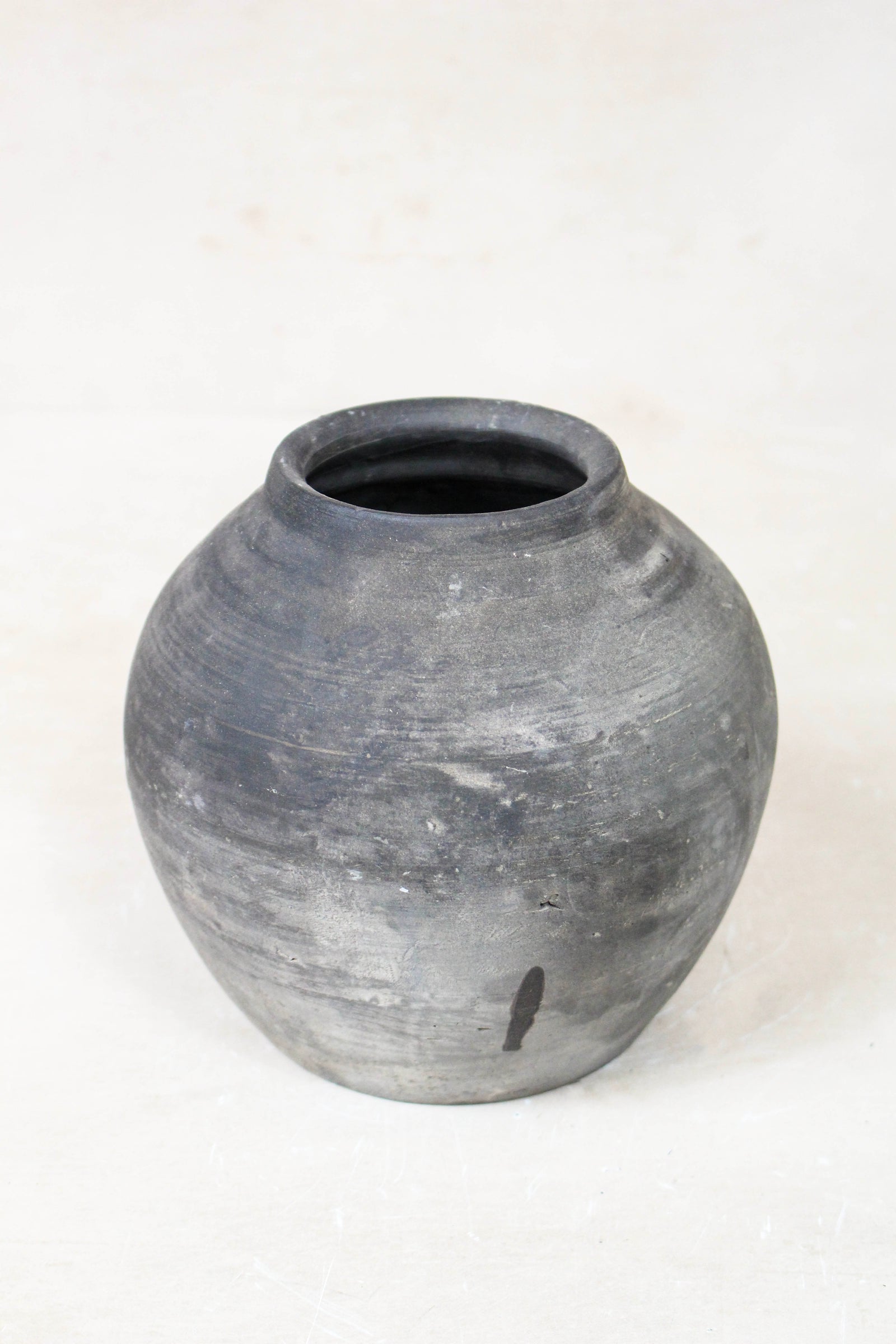 Small vintage dark unglazed earthenware pot from Shanxi, China