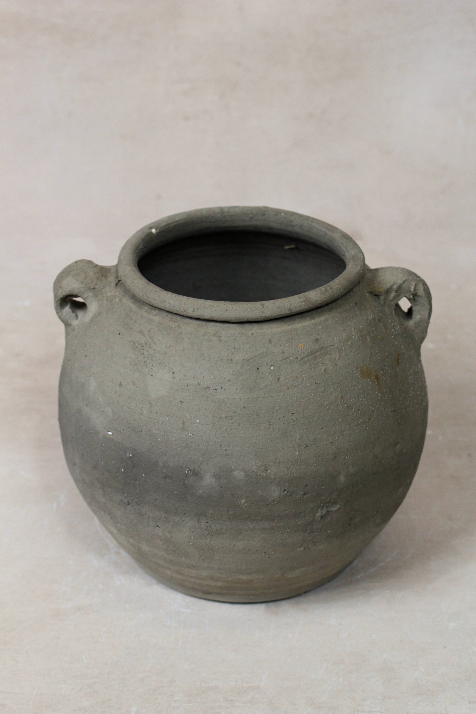 Small vintage dark unglazed earthenware pot from Shanxi, China