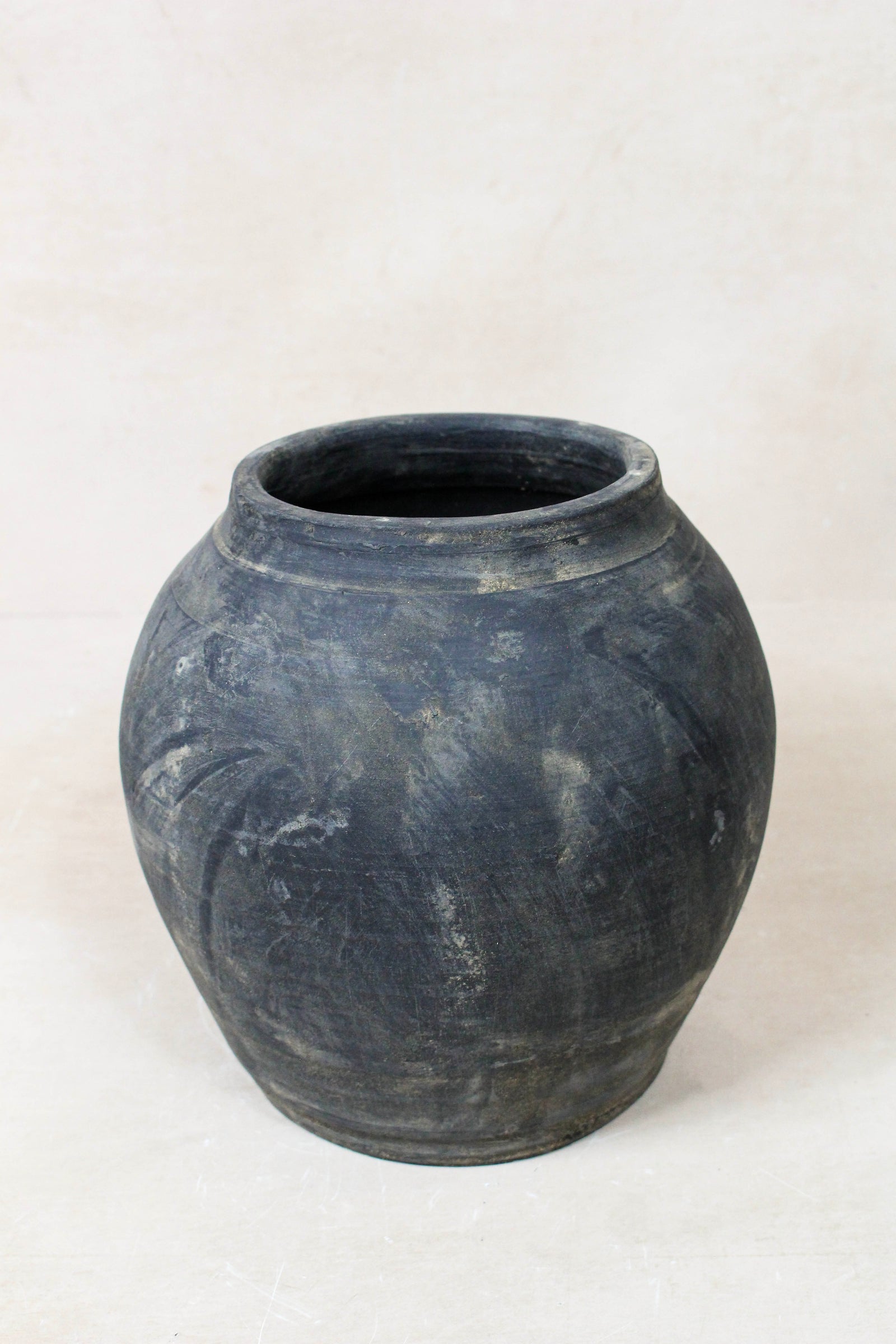 Small vintage dark unglazed earthenware pot from Shanxi, China