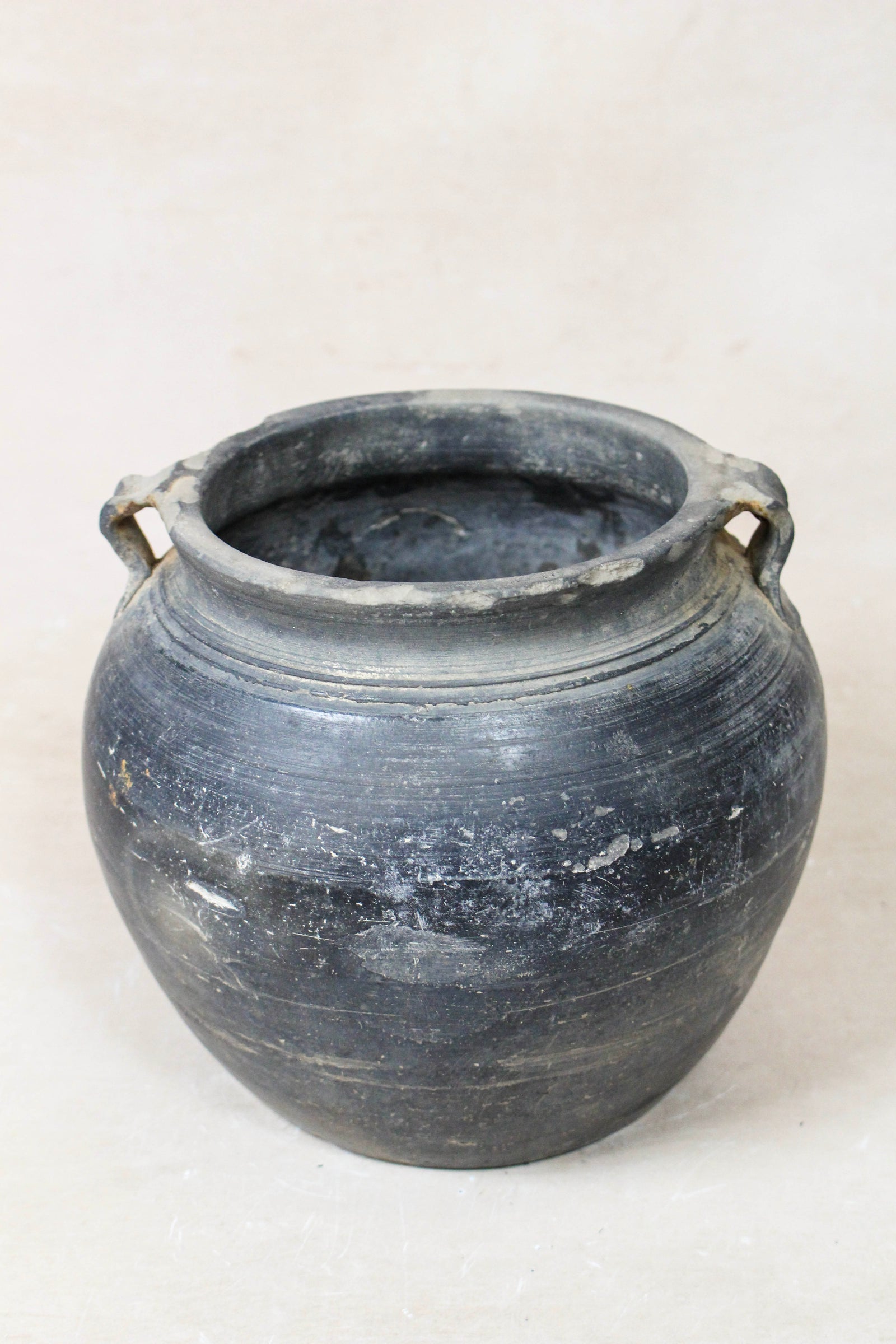 Small vintage dark unglazed earthenware pot from Shanxi, China