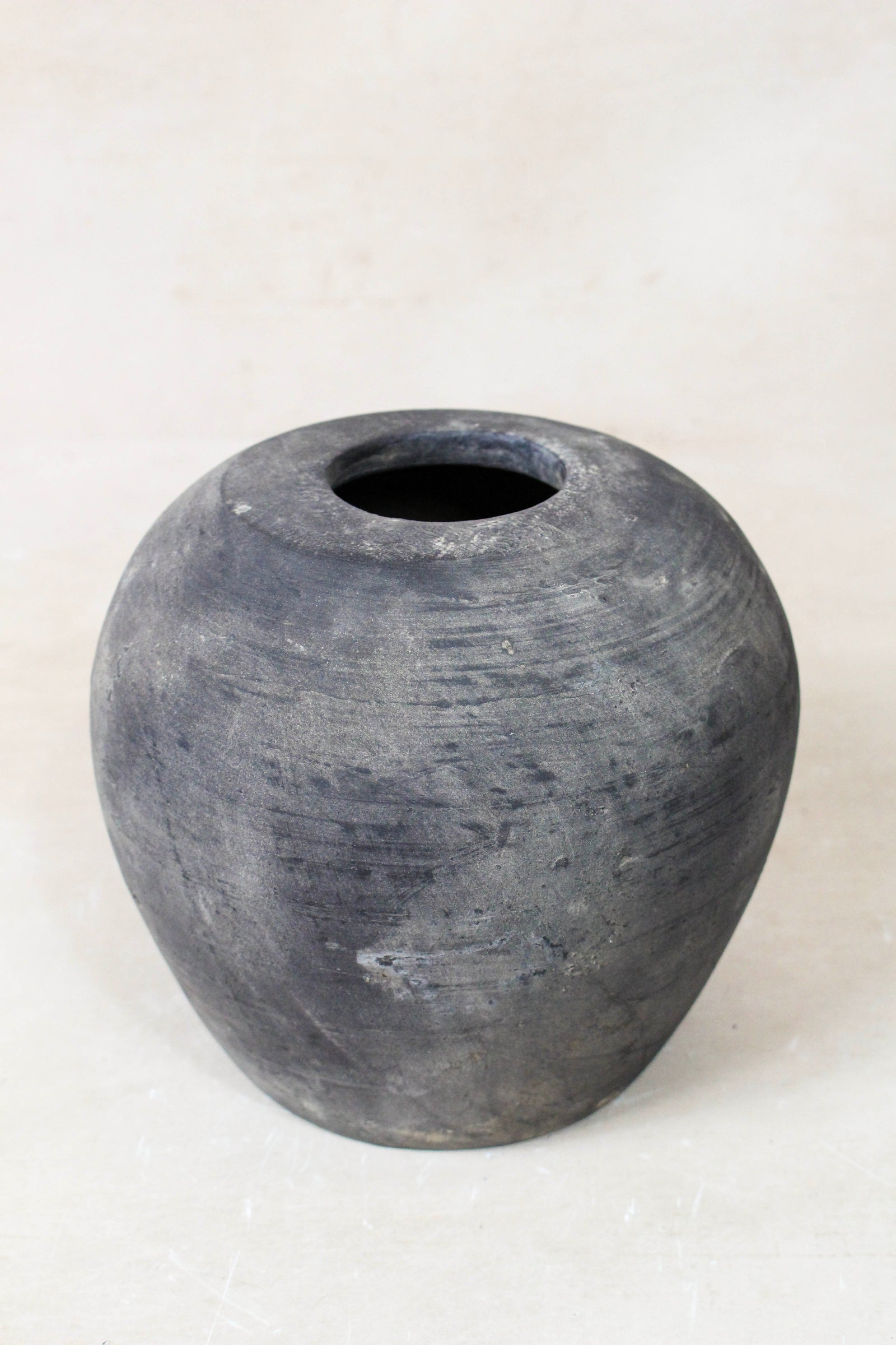 Small vintage dark unglazed earthenware pot from Shanxi, China