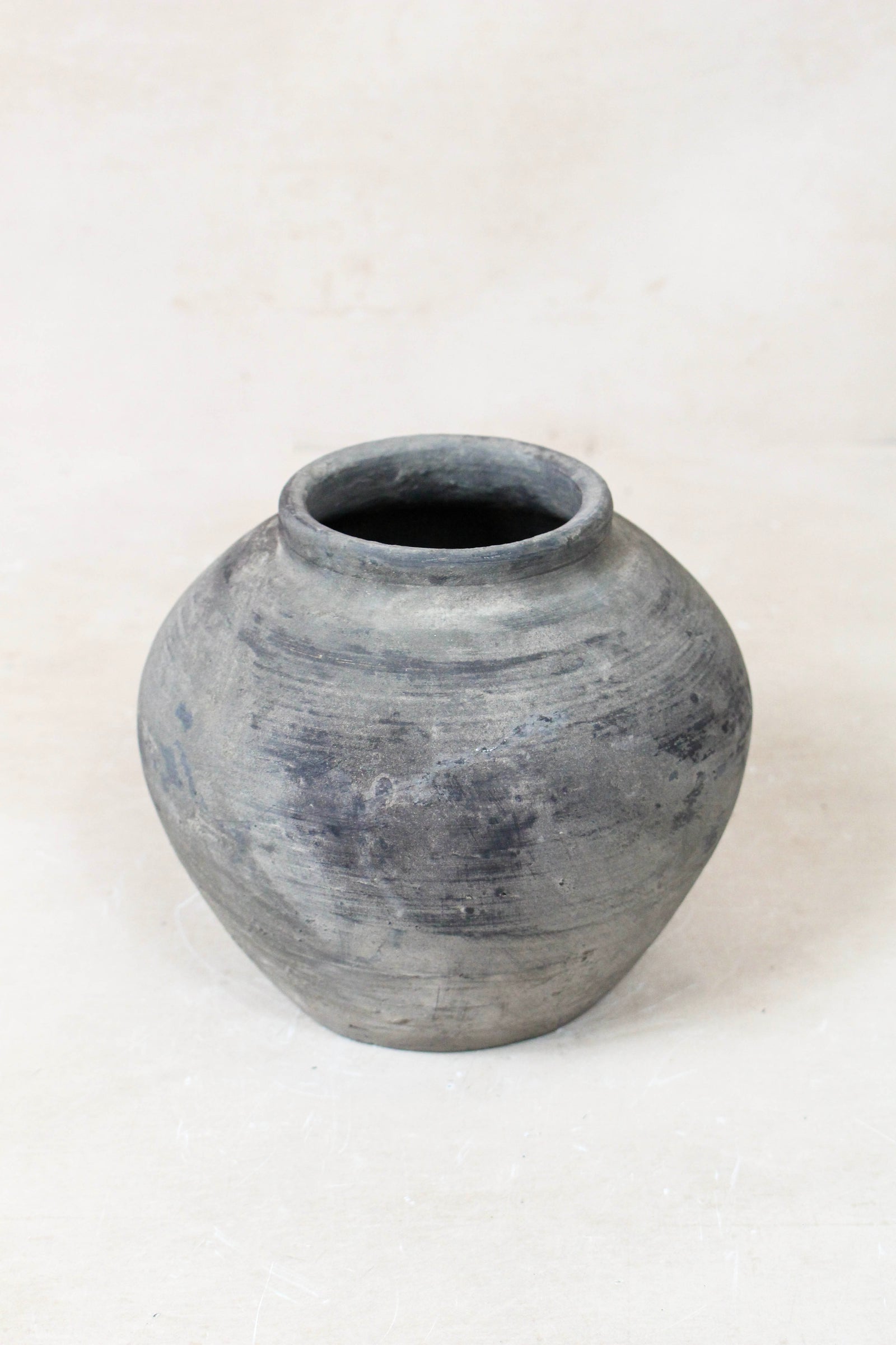 Small vintage dark unglazed earthenware pot from Shanxi, China