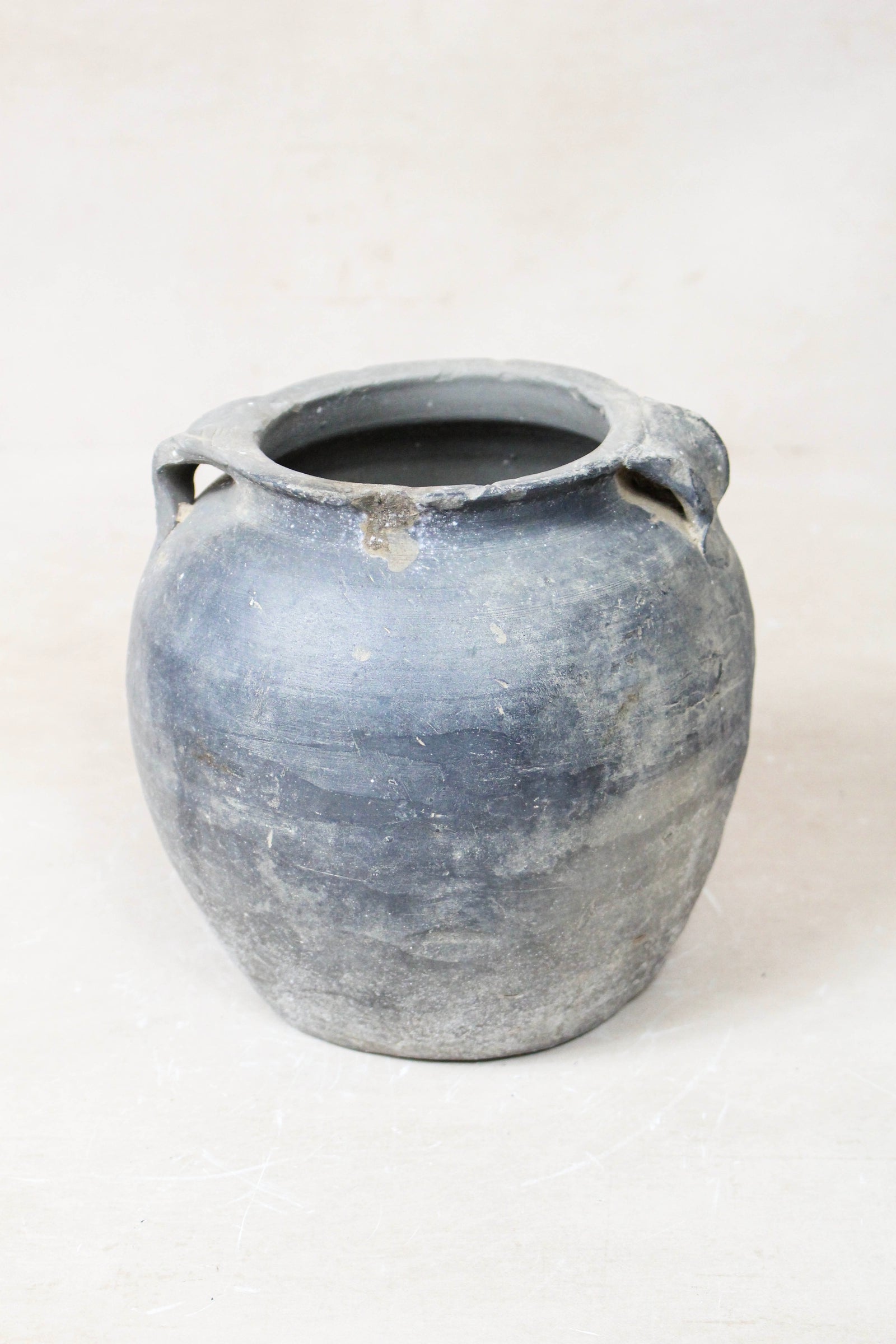 Small vintage dark unglazed earthenware pot from Shanxi, China